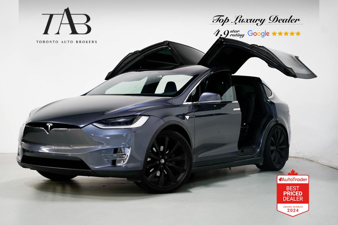 This Magnificent 2019 Tesla Model X 100D is a Canadian Vehicle with Clean Carfax Report. Its an all-electric luxury SUV that combines groundbreaking technology with futuristic design. Known for its distinctive Falcon Wing doors and spacious cabin, it offers a blend of performance, innovation, and comfort. With impressive acceleration, an extensive range, and advanced Autopilot features, the Model X 100D redefines what an SUV can be, making it a standout in the realm of electric vehicles.

 Key Features Includes:

- Dual Motor All-Wheel Drive
- Falcon Wing Doors
- Autopilot with Full Self-Driving Capability
- 17-inch Touchscreen Display
- Over-the-Air Software Updates
- Premium Interior with wooden trim
- Premium Sound System
- Panoramic Windshield
- 360-Degree Camera System
- Automatic Emergency Braking
- Keyless Entry and Remote Start
- 22" Alloy Wheels

NOW OFFERING 3 MONTH DEFERRED FINANCING PAYMENTS ON APPROVED CREDIT. 

WE OFFER THE BEST FINANCE RATES, AND DONT CHARGE ANY FINANCING FEE

Looking for a top-rated pre-owned luxury car dealership in the GTA? Look no further than Toronto Auto Brokers (TAB)! Were proud to have won multiple awards, including the 2024 AutoTrader Best Priced Dealer, 2024 CBRB Dealer Award, the Canadian Choice Award 2024, the 2024 BNS Award, the 2024 Three Best Rated Dealer Award, and many more!

With 30 years of experience serving the Greater Toronto Area, TAB is a respected and trusted name in the pre-owned luxury car industry. Our 30,000 sq.Ft indoor showroom is home to a wide range of luxury vehicles from top brands like BMW, Mercedes-Benz, Audi, Porsche, Land Rover, Jaguar, Aston Martin, Bentley, Maserati, and more. And we dont just serve the GTA, were proud to offer our services to all cities in Canada, including Vancouver, Montreal, Calgary, Edmonton, Winnipeg, Saskatchewan, Halifax, and more.

At TAB, were committed to providing a no-pressure environment and honest work ethics. As a family-owned and operated business, we treat every customer like family and ensure that every interaction is a positive one. Come experience the TAB Lifestyle at its truest form, luxury car buying has never been more enjoyable and exciting!

We offer a variety of services to make your purchase experience as easy and stress-free as possible. From competitive and simple financing and leasing options to extended warranties, aftermarket services, and full history reports on every vehicle, we have everything you need to make an informed decision. We welcome every trade, even if youre just looking to sell your car without buying, and when it comes to financing or leasing, we offer same day approvals, with access to over 50 lenders, including all of the banks in Canada. Feel free to check out your own Equifax credit score without affecting your credit score, simply click on the Equifax tab above and see if you qualify.

So if youre looking for a luxury pre-owned car dealership in Toronto, look no further than TAB! We proudly serve the GTA, including Toronto, Etobicoke, Woodbridge, North York, York Region, Vaughan, Thornhill, Richmond Hill, Mississauga, Scarborough, Markham, Oshawa, Peteborough, Hamilton, Newmarket, Orangeville, Aurora, Brantford, Barrie, Kitchener, Niagara Falls, Oakville, Cambridge, Kitchener, Waterloo, Guelph, London, Windsor, Orillia, Pickering, Ajax, Whitby, Durham, Cobourg, Belleville, Kingston, Ottawa, Montreal, Vancouver, Winnipeg, Calgary, Edmonton, Regina, Halifax, and more.

Call us today or visit our website to learn more about our inventory and services. And remember, all prices exclude applicable taxes and licensing, and vehicles can be certified at an additional cost of $799.