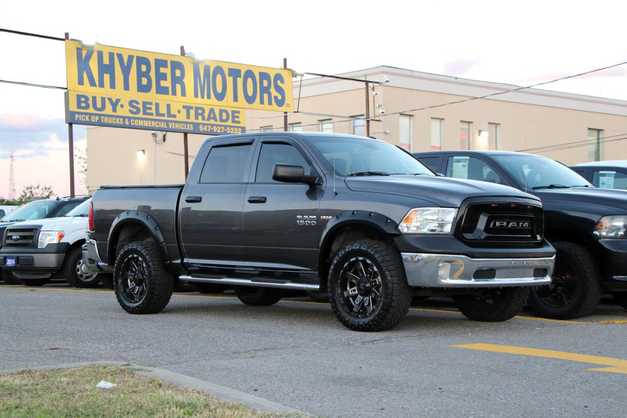 Used 2015 RAM 1500 4WD Crew Cab 140.5