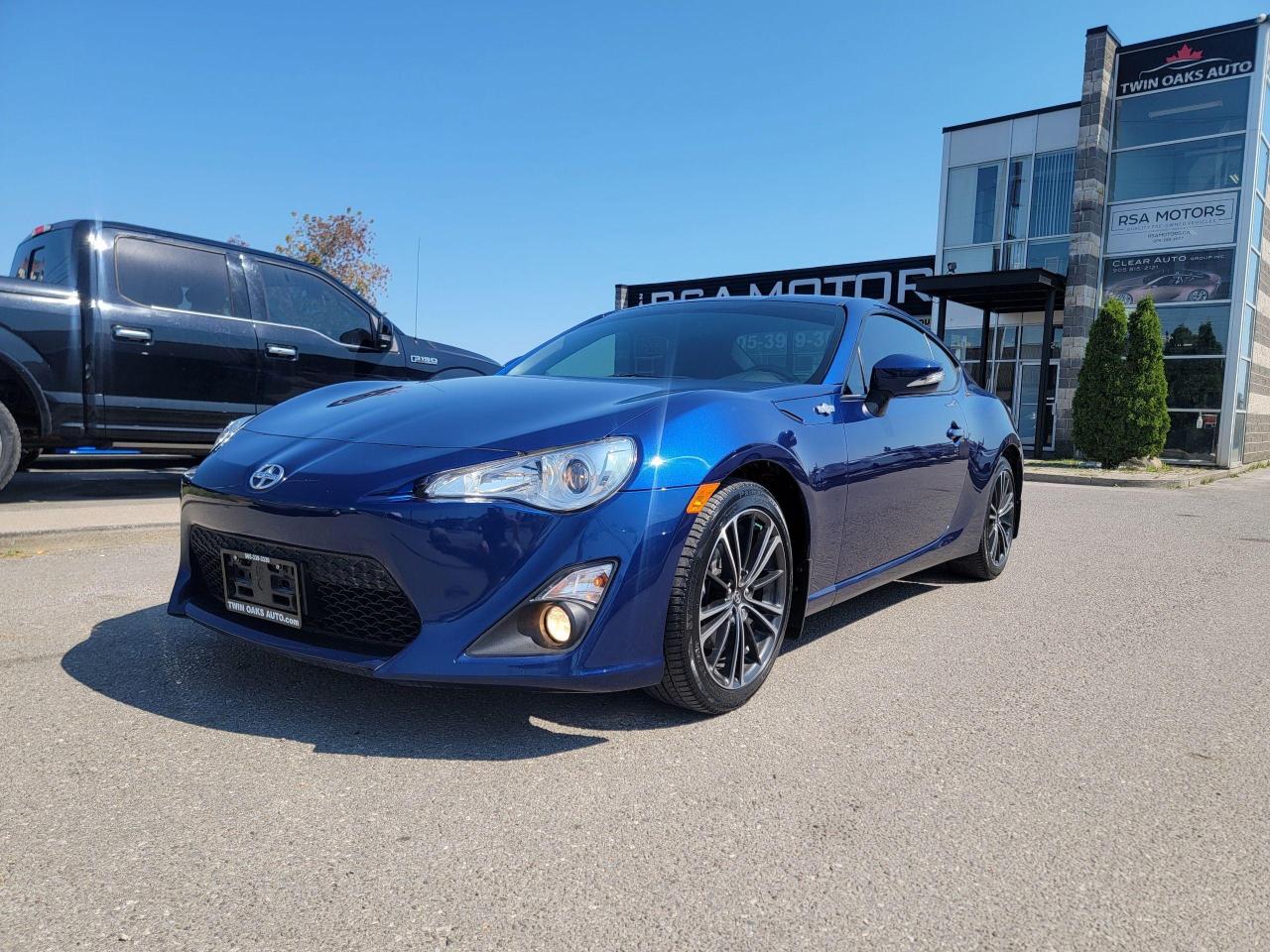 <p>BEAUTIFUL 2014 SCION FR-S! SUPER CLEAN! MEATALLIC BLUE, MINT INTERIOR! HEATED SEATS, BLUETOOTH! DRIVES AMAZING!! CALL TODAY!!</p><p> </p><p>THE FULL CERTIFICATION COST OF THIS VEICHLE IS AN <strong>ADDITIONAL $690+HST</strong>. THE VEHICLE WILL COME WITH A FULL VAILD SAFETY AND 36 DAY SAFETY ITEM WARRANTY. THE OIL WILL BE CHANGED, ALL FLUIDS TOPPED UP AND FRESHLY DETAILED. WE AT TWIN OAKS AUTO STRIVE TO PROVIDE YOU A HASSLE FREE CAR BUYING EXPERIENCE! WELL HAVE YOU DOWN THE ROAD QUICKLY!!! </p><p><strong>Financing Options Available!</strong></p><p><strong>TO CALL US 905-339-3330 </strong></p><p>We are located @ 2470 ROYAL WINDSOR DRIVE (BETWEEN FORD DR AND WINSTON CHURCHILL) OAKVILLE, ONTARIO L6J 7Y2</p><p>PLEASE SEE OUR MAIN WEBSITE FOR MORE PICTURES AND CARFAX REPORTS</p><p><span style=font-size: 18pt;>TwinOaksAuto.Com</span></p>