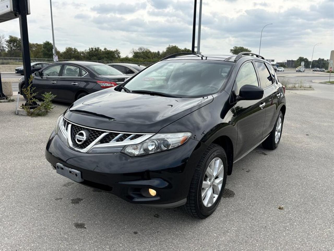Introducing a 2012 Nissan Murano SV, a reliable midsize SUV that is equipped with a 3.5L V6 engine that delivers a powerful 260 horsepower and 240 ft. lbs. of torque. This vehicle boasts a spacious and comfortable interior that can accommodate up to five passengers. The factory default features include 18-inch alloy wheels, automatic headlights, keyless entry, dual-zone automatic climate control, a six-speaker sound system, and a 7-inch touchscreen display. Safety features include stability control, traction control, and a rearview camera. With a fuel economy of 13.1 L/100km in the city and 10.2 L/100km on the highway, this vehicle is both practical and efficient. Overall, this 2012 Nissan Murano SV is in excellent condition and is a great choice for anyone in need of a reliable SUV. $11988 but price dropped to $9,988 for a limited time
