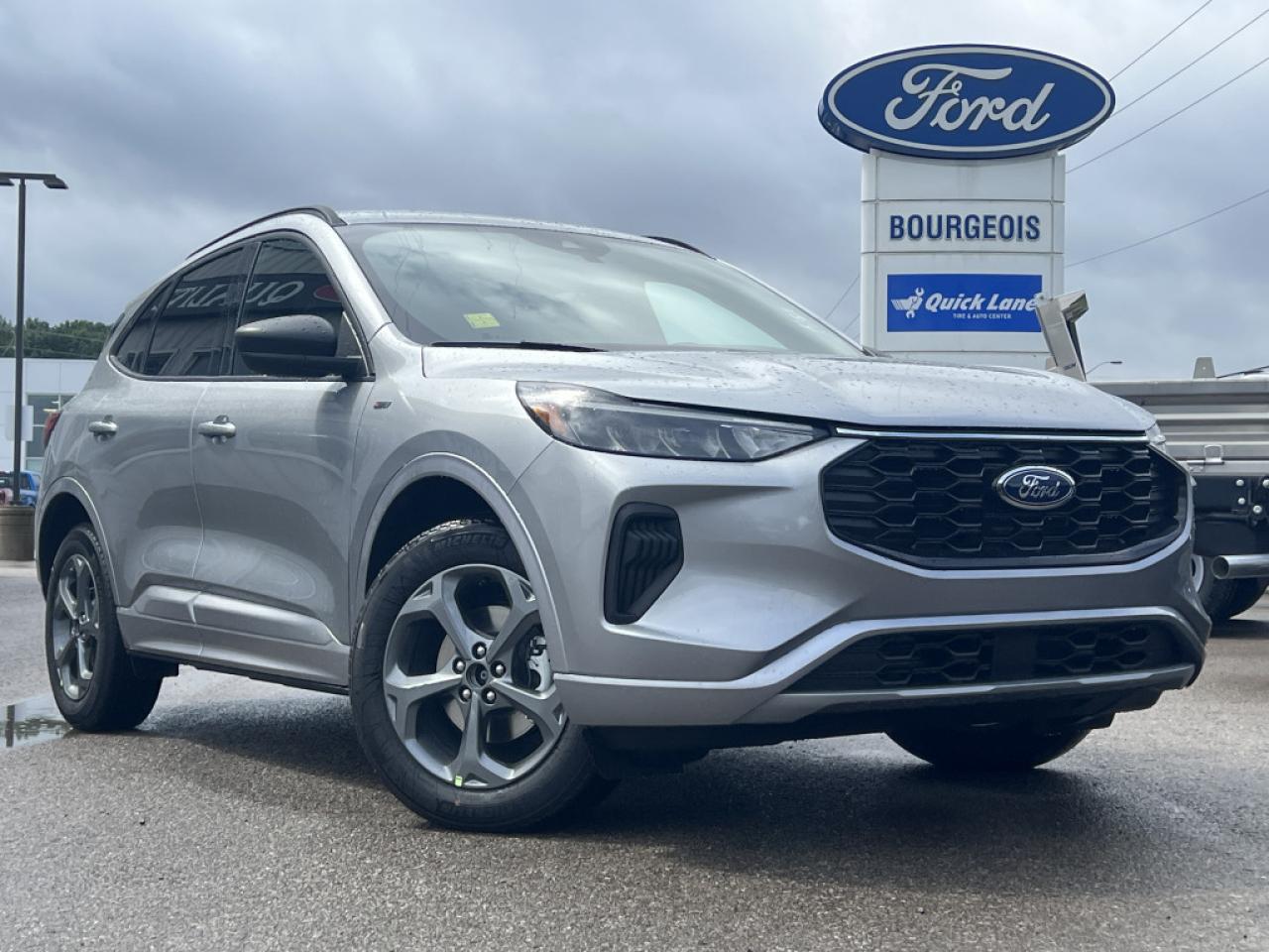 <b>Heated Seats, Cold Weather Package, Heated Steering Wheel, Remote Engine Start, Hybrid!</b><br> <br> <br> <br>Please note that on 2024 Escape PHEV models, the price includes the $5000 in Federal Government iZEV rebates for customers that choose to purchase or lease their new Ford Escape PHEV over 48 months. Federal incentive may vary for shorter term leases.   With limitless capability, this Ford Escape is ready for wherever your next adventure takes you. <br> <br>This Ford Escape was built for an active lifestyle and offers plenty of options for you to hit the road in your own individual style. Whether you need a family SUV for soccer practice, a capable adventure vehicle, or both, the versatile Ford Escape has you covered. Built for those who live on the go, the 2024 Ford Escape is made to be unstoppable.<br> <br> This iconic silver metallic SUV  has a cvt transmission and is powered by a  163HP 2.5L 4 Cylinder Engine.<br> <br> Our Escapes trim level is ST-Line. This sporty ST-Line adds on aluminum wheels, body colored exterior styling and ActiveX synthetic leather seating upholstery, along with amazing standard features such as a power-operated liftgate for rear cargo access, LED headlights with automatic high beams, an 8-inch infotainment screen powered by SYNC 4 with wireless Apple CarPlay and Android Auto, FordPass Connect with 4G mobile internet hotspot access, and proximity keyless entry with push button start. Road safety features include blind spot detection, pre-collision assist with automatic emergency braking and a back-up camera, lane keeping assist, lane departure warning, and front and rear collision mitigation. Additional features include dual-zone climate control, front and rear cupholders, smart device remote engine start, and even more. This vehicle has been upgraded with the following features: Heated Seats, Cold Weather Package, Heated Steering Wheel, Remote Engine Start, Hybrid, Power Heated Mirrors. <br><br> View the original window sticker for this vehicle with this url <b><a href=http://www.windowsticker.forddirect.com/windowsticker.pdf?vin=1FMCU9MZ9RUB35137 target=_blank>http://www.windowsticker.forddirect.com/windowsticker.pdf?vin=1FMCU9MZ9RUB35137</a></b>.<br> <br>To apply right now for financing use this link : <a href=https://www.bourgeoismotors.com/credit-application/ target=_blank>https://www.bourgeoismotors.com/credit-application/</a><br><br> <br/> 6.49% financing for 84 months.  Incentives expire 2024-12-02.  See dealer for details. <br> <br>Discount on vehicle represents the Cash Purchase discount applicable and is inclusive of all non-stackable and stackable cash purchase discounts from Ford of Canada and Bourgeois Motors Ford and is offered in lieu of sub-vented lease or finance rates. To get details on current discounts applicable to this and other vehicles in our inventory for Lease and Finance customer, see a member of our team. </br></br>Discover a pressure-free buying experience at Bourgeois Motors Ford in Midland, Ontario, where integrity and family values drive our 78-year legacy. As a trusted, family-owned and operated dealership, we prioritize your comfort and satisfaction above all else. Our no pressure showroom is lead by a team who is passionate about understanding your needs and preferences. Located on the shores of Georgian Bay, our dealership offers more than just vehiclesits an experience rooted in community, trust and transparency. Trust us to provide personalized service, a diverse range of quality new Ford vehicles, and a seamless journey to finding your perfect car. Join our family at Bourgeois Motors Ford and let us redefine the way you shop for your next vehicle.<br> Come by and check out our fleet of 70+ used cars and trucks and 170+ new cars and trucks for sale in Midland.  o~o