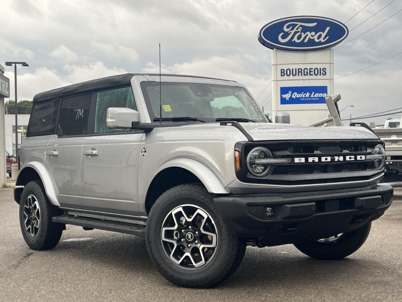 <p>Introducing the all-new Ford Bronco Outer Banks 4 Door 4x4, a stunning SUV that combines rugged capability with sophisticated styling in a sleek silver exterior. This vehicle is designed to conquer any terrain with ease, thanks to its powerful 4×4 drivetrain and a robust 2.3L 4-cyl engine that delivers an impressive 275 RPM at 5700. With just 90 km on the odometer, this Bronco is brand new and ready to take you on your next adventure.</p><p>The exterior of the Bronco Outer Banks is complemented by stylish alloy wheels and heated mirrors, while the interior boasts a luxurious black leather interior with a leather steering wheel and leather/metal-look gear shift, ensuring a comfortable and premium feel. Heated front seats keep you warm on chilly mornings, and the power seats ensure you find the perfect driving position with ease.</p><p>Technology-wise, the Bronco is equipped with a host of modern features to enhance your driving experience. Enjoy the convenience of keyless entry, remote start, and a backup camera for effortless maneuvering. Stay connected with Bluetooth connection, smart device integration, and a Wi-Fi hotspot, while a satellite radio and advanced sound system provide endless entertainment. Safety is paramount, with lane assist, parking sensors, and brake assist among the advanced driver assistance systems that make every journey safer.</p><p>This Ford Bronco Outer Banks is the perfect choice for adventurers who demand excellence in performance, comfort, and technology. Whether you're navigating the urban jungle or exploring off the beaten path, this SUV stands ready to meet your needs. We encourage those who seek an unparalleled driving experience to contact the dealership today for more information. Don't miss the chance to make this extraordinary vehicle yours.</p> <p><span style=color:rgb( 58 , 80 , 95 )>The discount shown on vehicle represents the </span><u>Cash Purchase</u><span style=color:rgb( 58 , 80 , 95 )> discount and is inclusive of all non-stackable and stackable cash purchase discounts from Ford of Canada and Bourgeois Ford North and is offered in lieu of sub-vented lease or finance rates. To get details on current discounts applicable to this and other vehicles in our inventory for Lease and Finance customer, see a member of our team. All offers for lease or finance are On Approved Credit (OAC).While every effort is made to ensure the accuracy of discounts and programs, programs are subject to change without notice </span><span style=color:rgb( 119 , 119 , 119 )>and may not be accurate or completely current. While every reasonable effort is made to ensure the accuracy of this data, we are not responsible for any errors or omissions contained on these pages.</span></p> <p><strong>Financing Your Next Vehicle with Bourgeois Motors Ford in Midland:</strong></p><p>At Bourgeois Motors Ford, we make financing your next vehicle simple and stress-free! Our team works with trusted lenders to find flexible options tailored to your budget. Drive away with confidenceapply today!</p><p>Take advantage of our online pre-qualification tool, backed by Equifax and TD Bank to find the payment that works for you. Simply <a href=https://www.bourgeoismotors.com/free-credit-check/ rel=nofollow><strong>CLICK HERE</strong></a><strong> </strong>to use our secure online credit tool with no impact to your credit.</p>