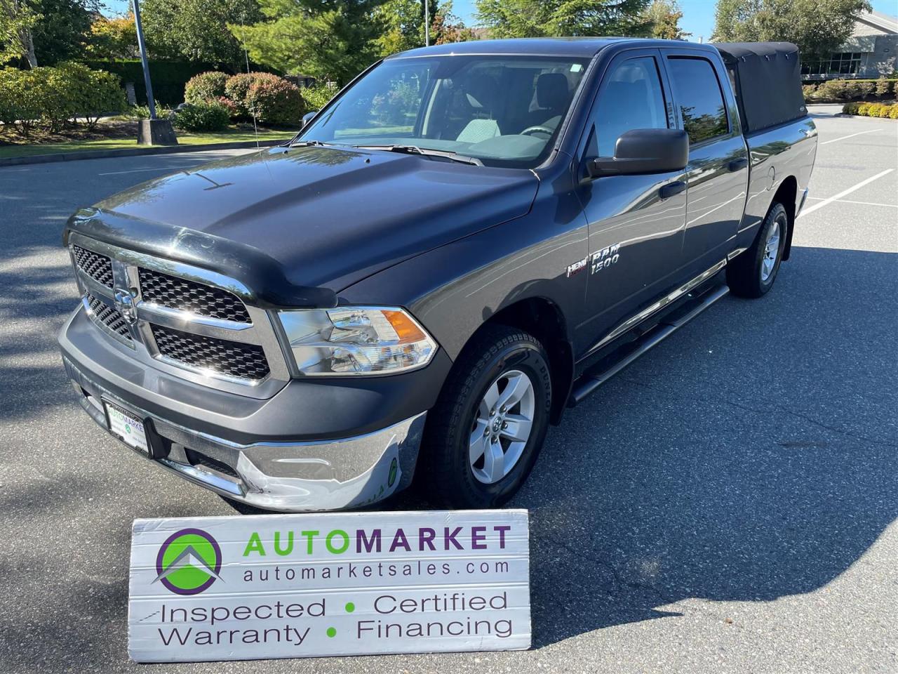 ONE OWNER, LOCAL TRUCK AND NO ACCIDENT CLAIMS. LOADED 4X4 WITH HEMI AND POWER GROUP. FINANCING, WARRANTY, INSPECTED WITH BCAA MEMBERSHIP!<br /><br />Welcome to the Automarket, your community Financing Dealership of "YES". We are featuring an extremely clean and tidy Ram 1500 with All Power Options, 4x4, Hemi Engine, Folding and Removable Canopy, Alloy Wheels and so much more.<br /><br />This is a One Owner, Local Truck and it has NEVER been in an accident. Having been fully inspected, we know that the Tires are 70% New on all 4 corners and the Brakes are 100% Brand New in the Front and 50% New in the Rear. The oil has been changed and trhe Battery and Coolant has been tested. We also completely detailed the vehicle for your enjoyment and Peace of Mind.<br /><br />2 LOCATIONS TO SERVE YOU, BE SURE TO CALL FIRST TO CONFIRM WHERE THE VEHICLE IS PARKED<br />WHITE ROCK 604-542-4970 LANGLEY 604-533-1310 OWNER'S CELL 604-649-0565<br /><br />We are a family owned and operated business since 1983 and we are committed to offering outstanding vehicles backed by exceptional customer service, now and in the future.<br />What ever your specific needs may be, we will custom tailor your purchase exactly how you want or need it to be. All you have to do is give us a call and we will happily walk you through all the steps with no stress and no pressure.<br />WE ARE THE HOUSE OF YES?<br />ADDITIONAL BENFITS WHEN BUYING FROM SK AUTOMARKET:<br />ON SITE FINANCING THROUGH OUR 17 AFFILIATED BANKS AND VEHICLE FINANCE COMPANIES<br />IN HOUSE LEASE TO OWN PROGRAM.<br />EVRY VEHICLE HAS UNDERGONE A 120 POINT COMPREHENSIVE INSPECTION<br />EVERY PURCHASE INCLUDES A FREE POWERTRAIN WARRANTY<br />EVERY VEHICLE INCLUDES A COMPLIMENTARY BCAA MEMBERSHIP FOR YOUR SECURITY<br />EVERY VEHICLE INCLUDES A CARFAX AND ICBC DAMAGE REPORT<br />EVERY VEHICLE IS GUARANTEED LIEN FREE<br />DISCOUNTED RATES ON PARTS AND SERVICE FOR YOUR NEW CAR AND ANY OTHER FAMILY CARS THAT NEED WORK NOW AND IN THE FUTURE.<br />36 YEARS IN THE VEHICLE SALES INDUSTRY<br />A+++ MEMBER OF THE BETTER BUSINESS BUREAU<br />RATED TOP DEALER BY CARGURUS 2 YEARS IN A ROW<br />MEMBER IN GOOD STANDING WITH THE VEHICLE SALES AUTHORITY OF BRITISH COLUMBIA<br />MEMBER OF THE AUTOMOTIVE RETAILERS ASSOCIATION<br />COMMITTED CONTRIBUTER TO OUR LOCAL COMMUNITY AND THE RESIDENTS OF BC<br /><br /> This vehicle has been Fully Inspected, Certified and Qualifies for Our Free Extended Warranty.Don't forget to ask about our Great Finance and Lease Rates. We also have a Options for Buy Here Pay Here and Lease to Own for Good Customers in Bad Situations. 2 locations to help you, White Rock and Langley. Be sure to call before you come to confirm the vehicles location and availability or look us up at www.automarketsales.com. White Rock 604-542-4970 and Langley 604-533-1310. Serving Surrey, Delta, Langley, Richmond, Vancouver, all of BC and western Canada. Financing & leasing available. CALL SK AUTOMARKET LTD. 6045424970. Call us toll-free at 1 877 813-6807. $495 Documentation fee and applicable taxes are in addition to advertised prices.<br />LANGLEY LOCATION DEALER# 40038<br />S. SURREY LOCATION DEALER #9987<br />