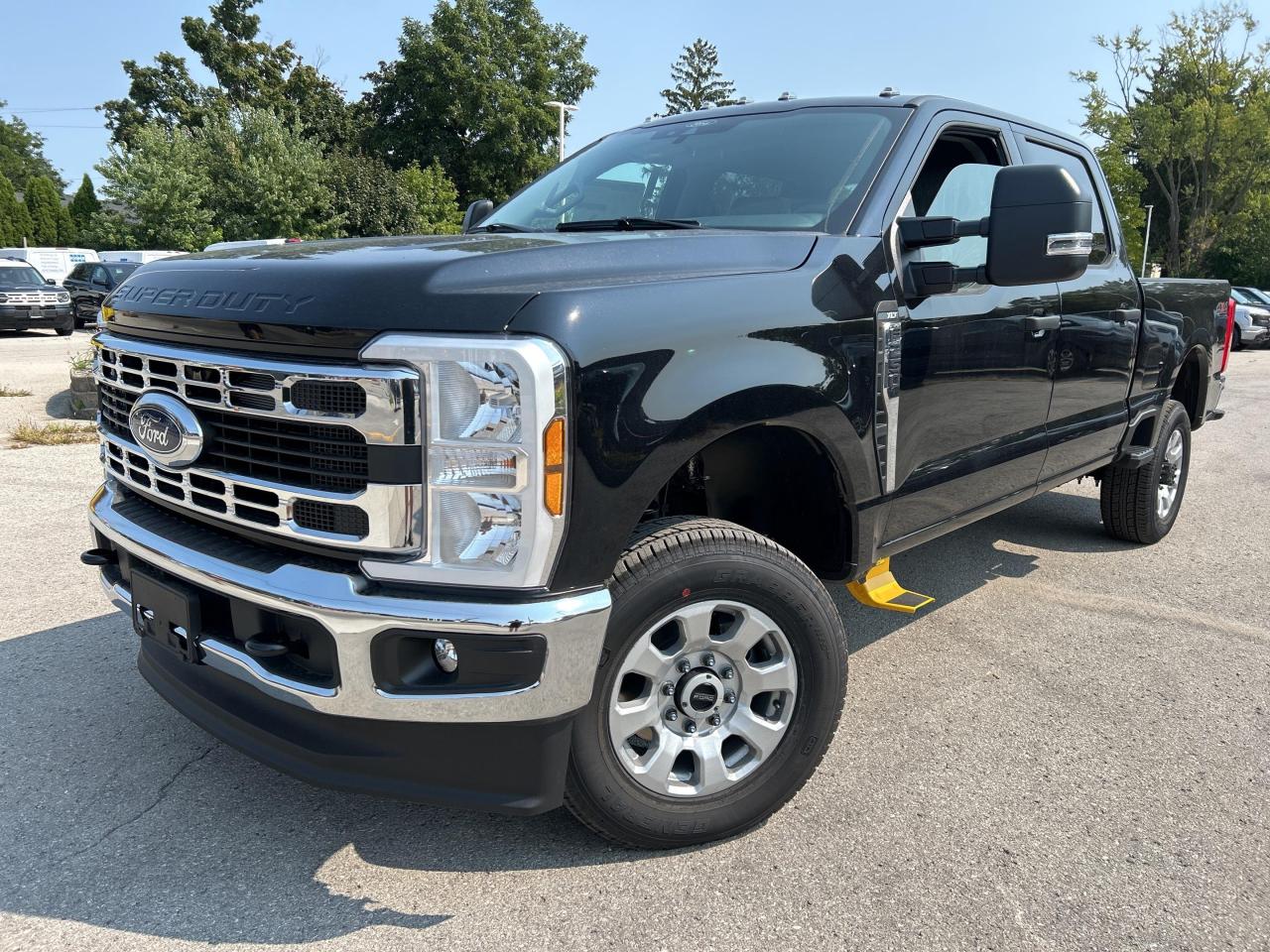 Tailgate Step, Remote Engine Start,  Snow Plow Prep Package  !           Many of our Demonstrators and Loaners are currently available for sale now that 2024 replacement vehicles have arrived. Ask for more details!    Why Buy From Winegard Ford?   * No Administration fees  * No Additional Charges for Factory Orders  * 100 Point Inspection on All Used Vehicles  * Full Tank of Fuel with Every New or Used Vehicle Purchase  * Licensed Ford Accessories Available  *  Window Tinting Available  * Custom Truck Lift and Leveling Packages Available         This Ford Super Duty is the toughest, most capable pickup truck that Ford has ever built, and that’s saying a lot.      The most capable truck for work or play, this heavy-duty Ford F-250 never stops moving forward and gives you the power you need, the features you want, and the style you crave! With high-strength, military-grade aluminum construction, this F-250 Super Duty cuts the weight without sacrificing toughness. The interior design is first class, with simple to read text, easy to push buttons and plenty of outward visibility. This truck is strong, extremely comfortable and ready for anything.      This agate black Super Crew 4X4 pickup   has an automatic transmission and is powered by a  7.3L V8 16V MPFI OHV engine.      Our F-250 Super Dutys trim level is XLT. This XLT trim steps things up with aluminum wheels, front fog lamps with automatic high beams, a power-adjustable drivers seat, three 12-volt DC and a 120-volt AC power outlets, beefy suspension thanks to heavy-duty dampers and robust axles, class V towing equipment with a hitch, trailer wiring harness, a brake controller and trailer sway control, manual extendable trailer-style side mirrors, box-side steps, and cargo box illumination. Additional features include an 8-inch infotainment screen powered by SYNC 4 with Apple CarPlay and Android Auto, FordPass Connect 5G mobile hotspot internet access, air conditioning, cruise control, remote keyless entry, smart device remote engine start, Ford Co-Pilot360 pre-collision assist with automatic emergency braking, forward collision mitigation, and a rearview camera. This vehicle has been upgraded with the following features: Tailgate Step, Remote Engine Start,  Snow Plow Prep Package  .       View the original window sticker for this vehicle with this url http://www.windowsticker.forddirect.com/windowsticker.pdf?vin=1FT7W2BNXREE96815.     To apply right now for financing use this link : http://www.winegardford.com/financing/application.htm            5.49% financing for 84 months.    Buy this vehicle now for the lowest bi-weekly payment of $588.68 with $0 down for 84 months @ 5.49% APR O.A.C. ( taxes included, $13 documentation fee   / Total cost of borrowing $18262   ).  Incentives expire 2024-12-02.  See dealer for details.       o~o