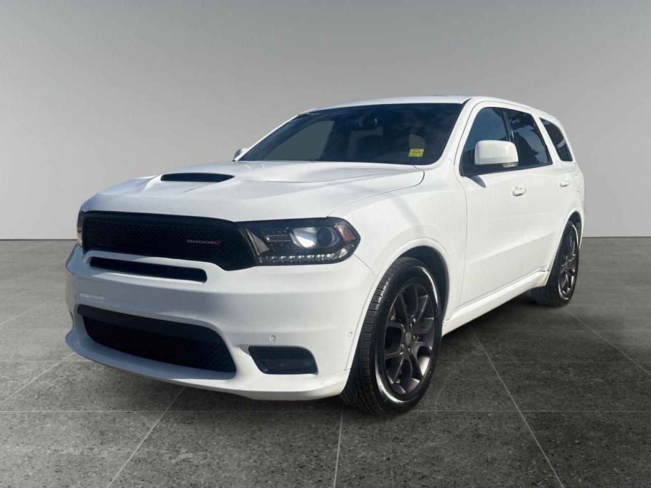 <b>Navigation,  Leather Seats,  Bluetooth,  Cooled Seats,  Premium Sound Package!</b><br> <br> We sell high quality used cars, trucks, vans, and SUVs in Saskatoon and surrounding area.<br> <br>   This Dodge Durango is a versatile SUV that offers more thrills than many of its competitors. This  2018 Dodge Durango is for sale today. <br> <br>This Dodge Durango offers drivers the best of everything. It starts with a well-appointed interior with a generous amount of room for cargo and passengers. Muscular styling sets this Durango apart from the softer crossovers on the market. Impressive confidence comes from a powerful, yet efficient drivetrain. The standard all-wheel drive capability is balanced by plush, upscale interior details making for a well-balanced, family friendly SUV. This  SUV has 146,001 kms. Its  white in colour  . It has a 8 speed automatic transmission and is powered by a  360HP 5.7L 8 Cylinder Engine.  <br> <br> Our Durangos trim level is R/T. Enjoy riding in this 2018 Dodge Durango R/T with its focus on interior comfort and convenience. Relax in the eight-way power driver seat with lumbar support, heating, and ventilation. A heated steering wheel keeps your hands warm in cool weather. Other features that are standard on this trim include Nappa leather seating, dual-zone climate control, remote keyless entry, push button start, cruise control, and Uconnect 8.4 with Bluetooth, navigation, and 9-speaker premium audio. This vehicle has been upgraded with the following features: Navigation,  Leather Seats,  Bluetooth,  Cooled Seats,  Premium Sound Package,  Heated Steering Wheel. <br> To view the original window sticker for this vehicle view this <a href=http://www.chrysler.com/hostd/windowsticker/getWindowStickerPdf.do?vin=1C4SDJCT2JC385361 target=_blank>http://www.chrysler.com/hostd/windowsticker/getWindowStickerPdf.do?vin=1C4SDJCT2JC385361</a>. <br/><br> <br/><br> Buy this vehicle now for the lowest bi-weekly payment of <b>$205.32</b> with $0 down for 84 months @ 5.99% APR O.A.C. ( Plus applicable taxes -  Plus applicable fees   ).  See dealer for details. <br> <br><br> We have been a trusted name in the Automotive industry for over 40 years. We have built our reputation on trust and quality service. With long standing relationships with our customers, you can trust us for advice and assistance on all your motoring needs. </br>

<br> With our Credit Repair program, and over 250 well-priced vehicles in stock, youll drive home happy, and thats a promise. We are driven to ensure the best in customer satisfaction and look forward working with you. </br> o~o