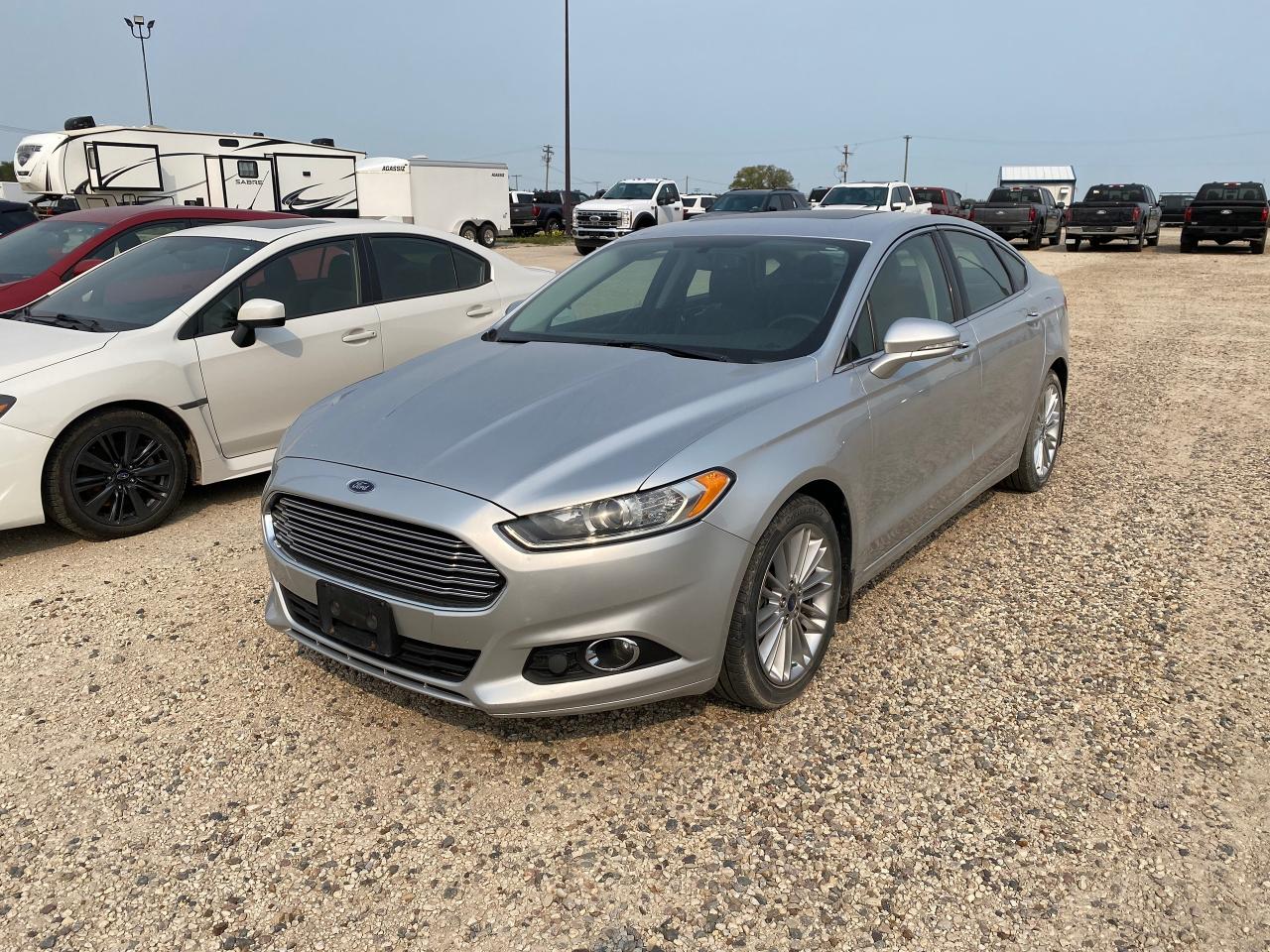 <p>Very nice 2014 Ford Fusion SE AWD with a 2.0L engine, only 129,000 kms, 6 speed auto transmission, heated front seats, moonroof, navigation and more!  Come see us for a test drive today!</p>