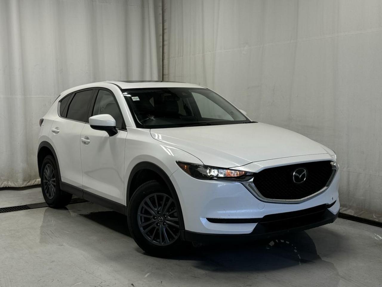 Fully Inspected, ALL Work Complete and Included in Price! Call Us For More Info at 587-409-5859 



Ladies and gentlemen, behold the sheer elegance of WHITE sophistication on four wheels: the 2021 Mazda CX-5 GS. Backup Camera, Heated Steering Wheel, Bluetooth, Adaptive Cruise Control, Sunroof, Leather/Suede Upholstery, Keyless Entry, Forward Collision Alert, Power Driver Seat, Heated Front Seats, A/C, Power Windows/Locks/Mirrors, Tilt/Telescopic Steering Wheel, Blind Spot Sensor, Keyless Remote, Power Trunk, Electronic Park Brake, Auto Hold, Auto Rain Sensing Wipers, Dual Zone A/C, Rear Air Vents, Lane Keep Assist, LED Headlights/Taillights, Rear Window Defrost, Alloy Wheels, AM/FM Radio, Steering Wheel Audio Controls, USB/AUX Input, Apple CarPlay & Android Auto  these are but a few of the high-value features that set this chariot apart from the rest. Step inside this vehicular wonder, where the black cloth/leather combination upholstery cradles you in comfort as if you were lounging in the coziest jazz club in town.



Now, this isnt just any run-of-the-mill chariot. Oh no, my friends, this is the embodiment of style and performance, with a 6-Speed Automatic Transmission that shifts as smoothly as a saxophone glides through a blues scale. And with All Wheel Drive, youll grip the road like a maestro grips his batonfirmly and with utter confidence. This used beauty has travelled 106452 kilometers, each one a testament to its enduring allure and reliability.



The heated seats for both driver and passenger are a warm embrace on a cold Alberta night, while the LED taillights ensure you leave a lasting impression, much like a classic tune that lingers long after the final note. Intelligent Access and a Backup Camera add convenience to this already impressive ensemble, while the Dual Zone Air Conditioning keeps the atmosphere inside as cool as the other side of the pillow.



But wait, theres moreBlind Spot Sensor technology ensures your safety is never in question, like a trusty news anchor you can always rely on. The Power Tilt/Sliding Sunroof lets you bask in the sunshine or gaze at the stars, whichever tickles your fancy. And lets not forget the Apple CarPlay and Android Auto, bringing the modern world to your fingertips.



Friends, this 2021 Mazda CX-5 GS, Stock Number 219799, isnt just a vehicle; its a statement. A statement that says, I have arrived, and I did it in style. Dont just take my word for itcome and see for yourself. This Mazda isnt just a mode of transportation; its a ticket to a world of luxury and charm. 





 Call 587-409-5859 for more info or to schedule an appointment! Listed Pricing is valid for 72 hours. Financing is available. Please see dealer for term availability and interest rates. AMVIC Licensed Business.