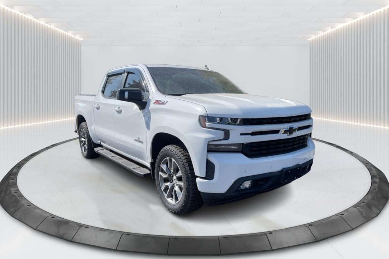 <ul><li><p><strong>Engine Options</strong>:</p><ul><li>5.3L V8 engine producing 355 horsepower and 383 lb-ft of torque, providing robust power and performance for a wide range of tasks, from towing to daily driving.</li><li>Available with Dynamic Fuel Management technology for optimized fuel efficiency when less power is needed.</li></ul></li><li><p><strong>Transmission</strong>:</p><ul><li>8-speed automatic transmission for smooth, responsive shifting and improved fuel economy.</li></ul></li><li><p><strong>Drive Options</strong>:</p><ul><li>Available Rear-Wheel Drive (RWD) or All-Wheel Drive (4WD), giving you the flexibility to choose the best option for your needs and driving conditions.</li></ul></li><li><p><strong>Fuel Economy</strong>:</p><ul><li>Estimated 16 MPG city / 22 MPG highway with the 5.3L V8 engine and RWD, offering a balanced combination of power and efficiency for a full-size pickup truck.</li></ul></li><li><p><strong>Interior Features</strong>:</p><ul><li>Spacious Crew Cab configuration with seating for up to 5 passengers, providing ample headroom and legroom for both front and rear occupants.</li><li>Premium cloth seating with available leather upholstery for added comfort and style.</li><li>10-way power-adjustable drivers seat and 6-way power-adjustable front passenger seat for personalized comfort.</li><li>8-inch Chevrolet Infotainment 3 touchscreen system with Apple CarPlay, Android Auto, and Bluetooth for seamless smartphone integration and entertainment options.</li><li>Dual-zone automatic climate control for separate temperature control for the driver and front passenger.</li><li>Rear-seat under-seat storage for added convenience and flexibility when carrying extra gear.</li><li>USB ports and a 12V power outlet for charging devices and powering accessories.</li></ul></li><li><p><strong>Technology & Convenience</strong>:</p><ul><li>Rearview camera with dynamic guidelines for safer parking and reversing.</li><li>Keyless entry and push-button start for added convenience.</li><li>Available wireless charging pad to keep devices charged without needing cords.</li><li>Available Bose premium audio system for enhanced sound quality on the go.</li><li>Steering wheel-mounted controls for easy access to audio, phone, and cruise control settings.</li></ul></li><li><p><strong>Safety Features</strong>:</p><ul><li>Standard Chevrolet Safety Assist suite of safety technologies, including:<ul><li>Forward Collision Alert with Automatic Emergency Braking to help reduce the risk of a front-end collision.</li><li>Lane Keep Assist with Lane Departure Warning to help keep the truck centered in its lane.</li><li>Rear Cross Traffic Alert to help detect vehicles approaching from behind when backing out of parking spaces.</li><li>Park Assist to assist with parking by automatically steering the truck into spaces.</li></ul></li><li>Anti-lock Braking System (ABS), Electronic Stability Control (ESC), and Traction Control System (TCS) for enhanced vehicle control.</li><li>Tire Pressure Monitoring System (TPMS) to alert you when tire pressure is low.</li><li>Standard airbags and reinforced safety structure to protect occupants in case of a collision.</li></ul></li><li><p><strong>Exterior Design</strong>:</p><ul><li>Bold and rugged RST (Rally Sport Truck) appearance with body-colored grille, front bumper, and accents for a sportier look.</li><li>20-inch polished aluminum wheels for a stylish and durable appearance.</li><li>LED daytime running lights and available LED headlights for improved visibility and modern styling.</li><li>Power-adjustable, heated side mirrors with available integrated turn signals for added safety and convenience.</li><li>CornerStep rear bumper for easier access to the truck bed.</li></ul></li><li><p><strong>Performance & Handling</strong>:</p><ul><li>Strong V8 engine provides impressive towing and payload capacity, making the Silverado RST an excellent choice for both work and recreation.</li><li>Responsive steering and suspension system, ensuring a smooth ride with stable handling both on and off the road.</li><li>Available 4WD for superior traction and stability in challenging weather conditions, such as rain, snow, or off-road environments.</li></ul></li><li><p><strong>Towing Capacity</strong>:</p><ul><li>Max towing capacity of up to 11,600 lbs when properly equipped, making it ideal for hauling trailers, boats, or recreational vehicles.</li></ul></li><li><p><strong>Payload Capacity</strong>:</p><ul><li>Payload capacity of up to 2,280 lbs, allowing you to carry heavy loads in the truck bed, such as construction materials or recreational gear.</li></ul></li><li><p><strong>Truck Bed Features</strong>:</p><ul><li>Short Box with ample space for hauling tools, gear, or equipment.</li><li>Available power tailgate for added convenience and easy access to the truck bed.</li><li>Available spray-on bedliner for added protection against scratches and wear.</li></ul></li><li><p><br></p><ul></ul></li></ul><p></p><p>The <strong>2019 Chevrolet Silverado RST Crew Cab Short Box 5.3L Engine</strong> offers a perfect combination of performance, technology, and versatility. With its powerful 5.3L V8 engine, comfortable interior, and advanced safety features, this full-size pickup is well-suited for both work and play. Whether youre hauling heavy loads, towing a trailer, or simply enjoying a road trip, the Silverado RST delivers a capable and comfortable driving experience. Its sporty design and modern tech make it a standout option in the competitive pickup truck segment.</p><p><span style=font-family: -apple-system, BlinkMacSystemFont, "Segoe UI", Roboto, "Helvetica Neue", Arial, "Noto Sans", "Liberation Sans", sans-serif, "Apple Color Emoji", "Segoe UI Emoji", "Segoe UI Symbol", "Noto Color Emoji";>Save time,  money and shopping frustration with our transparent, no-hassle pricing. We use state of the art technology to shop the competition for you and price our pre-owned vehicles to give you the best value, upfront, every time and back it up with a free market value report so you know you are getting the best deal! With no additional fees, theres no surprises either, the price you see is the price you pay, just add HST! We offer 50+ Vehicles on site with financing for our customers regardless of credit. We have a dedicated team of credit rebuilding experts on hand to help you get into the car of your dreams. We need your trade-in! We have a hassle free top dollar trade process and offer a free evaluation on your car. We will buy your vehicle even if you do not buy one from us!  THAT CAR PLACE has been in business for 27 years.  We are OMVIC Certified and and are Members of the UCDA earning your trust so you can buy with confidence.  50+ VEHICLES in ONE LOCATION. USED VEHICLE MARKET PRICING! We use an exclusive 3rd party marketing tool that accurately monitor vehicle prices to guarantee our customers get the best value. We implement Zero-Pressure, Hassle-Free sales process.  No hidden Admin Fees. VEHICLE HISTORY: Free Carfax report included with every purchase. AWARDS include National Dealer of the Year Winner of Outstanding Customer Satisfaction.  Voted #1 Best Used Car Dealership in London, Ont. 2014 to 2024.  Winner of Top Choice Award 6 times between the years 2015 and 2024.  Winner of Londons Readers Choice Award 2014 to 2023.  Accredited Better Business Bureau rating.  Each vehicle includes FULL SAFETY: Full safety inspection exceeding industry standards: all vehicles go through an intensive inspection RECONDITIONING. All brake pads or rotors below 50% material are replaced. Each vehicle sold receives a semi-synthetic oil-lube-filter and full detailing and clean up.</span></p>