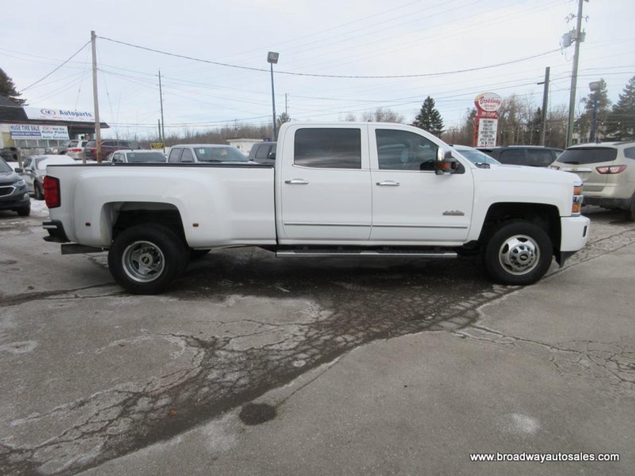 2015 Chevrolet Silverado 3500 1-TON HIGH-COUNTRY-MODEL 5 PASSENGER 6.6L - DURAMAX.. 4X4.. CREW-CAB.. 8-FOOT-DUALLY.. NAVIGATION.. POWER SUNROOF.. DVD PLAYERS.. HEATED/AC SEATS.. Photo