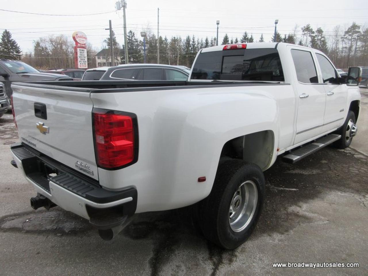2015 Chevrolet Silverado 3500 1-TON HIGH-COUNTRY-MODEL 5 PASSENGER 6.6L - DURAMAX.. 4X4.. CREW-CAB.. 8-FOOT-DUALLY.. NAVIGATION.. POWER SUNROOF.. DVD PLAYERS.. HEATED/AC SEATS.. Photo
