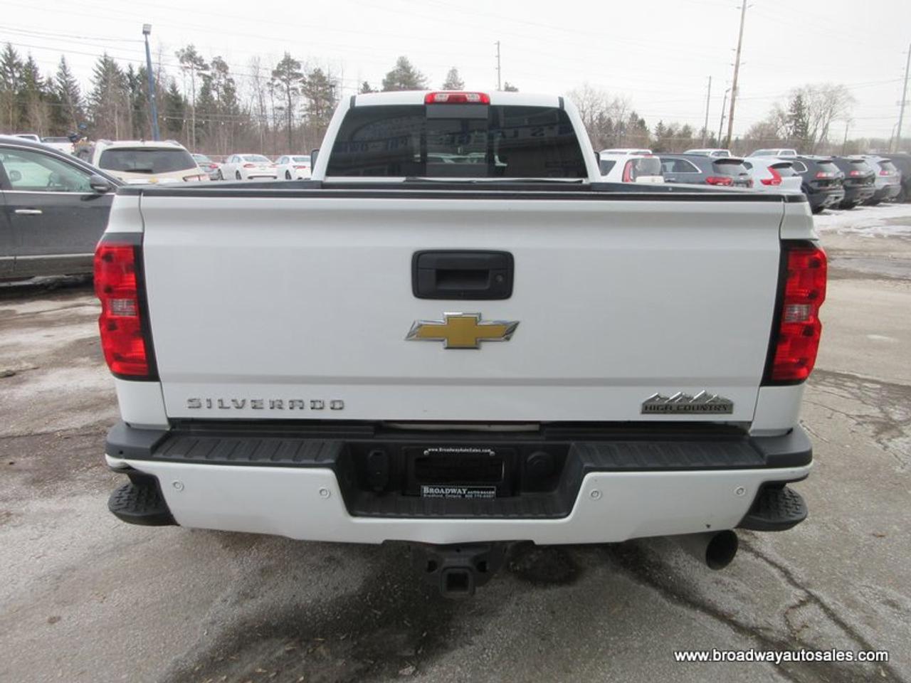 2015 Chevrolet Silverado 3500 1-TON HIGH-COUNTRY-MODEL 5 PASSENGER 6.6L - DURAMAX.. 4X4.. CREW-CAB.. 8-FOOT-DUALLY.. NAVIGATION.. POWER SUNROOF.. DVD PLAYERS.. HEATED/AC SEATS.. Photo