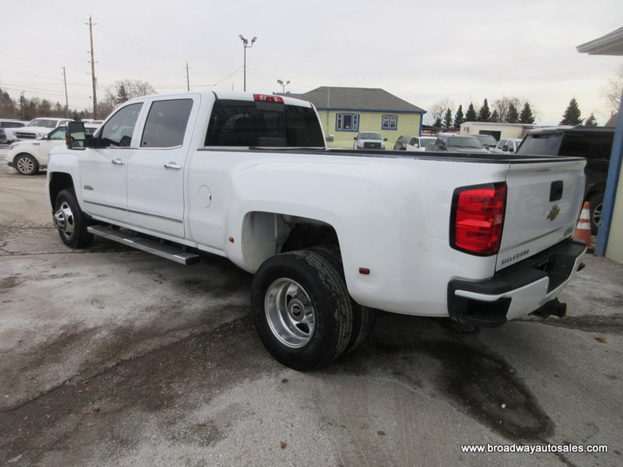 2015 Chevrolet Silverado 3500 1-TON HIGH-COUNTRY-MODEL 5 PASSENGER 6.6L - DURAMAX.. 4X4.. CREW-CAB.. 8-FOOT-DUALLY.. NAVIGATION.. POWER SUNROOF.. DVD PLAYERS.. HEATED/AC SEATS.. Photo