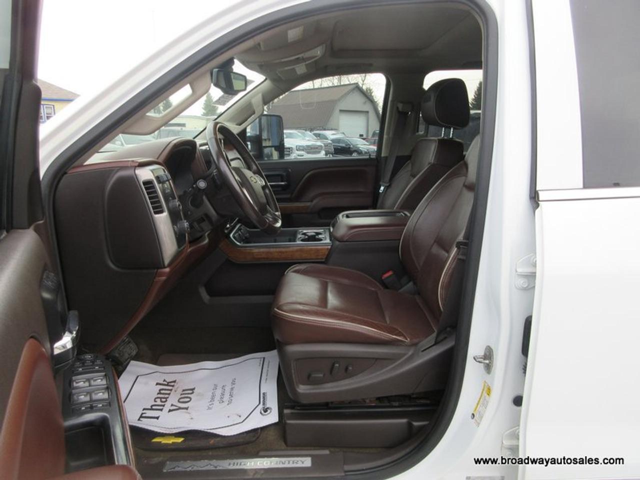 2015 Chevrolet Silverado 3500 1-TON HIGH-COUNTRY-MODEL 5 PASSENGER 6.6L - DURAMAX.. 4X4.. CREW-CAB.. 8-FOOT-DUALLY.. NAVIGATION.. POWER SUNROOF.. DVD PLAYERS.. HEATED/AC SEATS.. Photo
