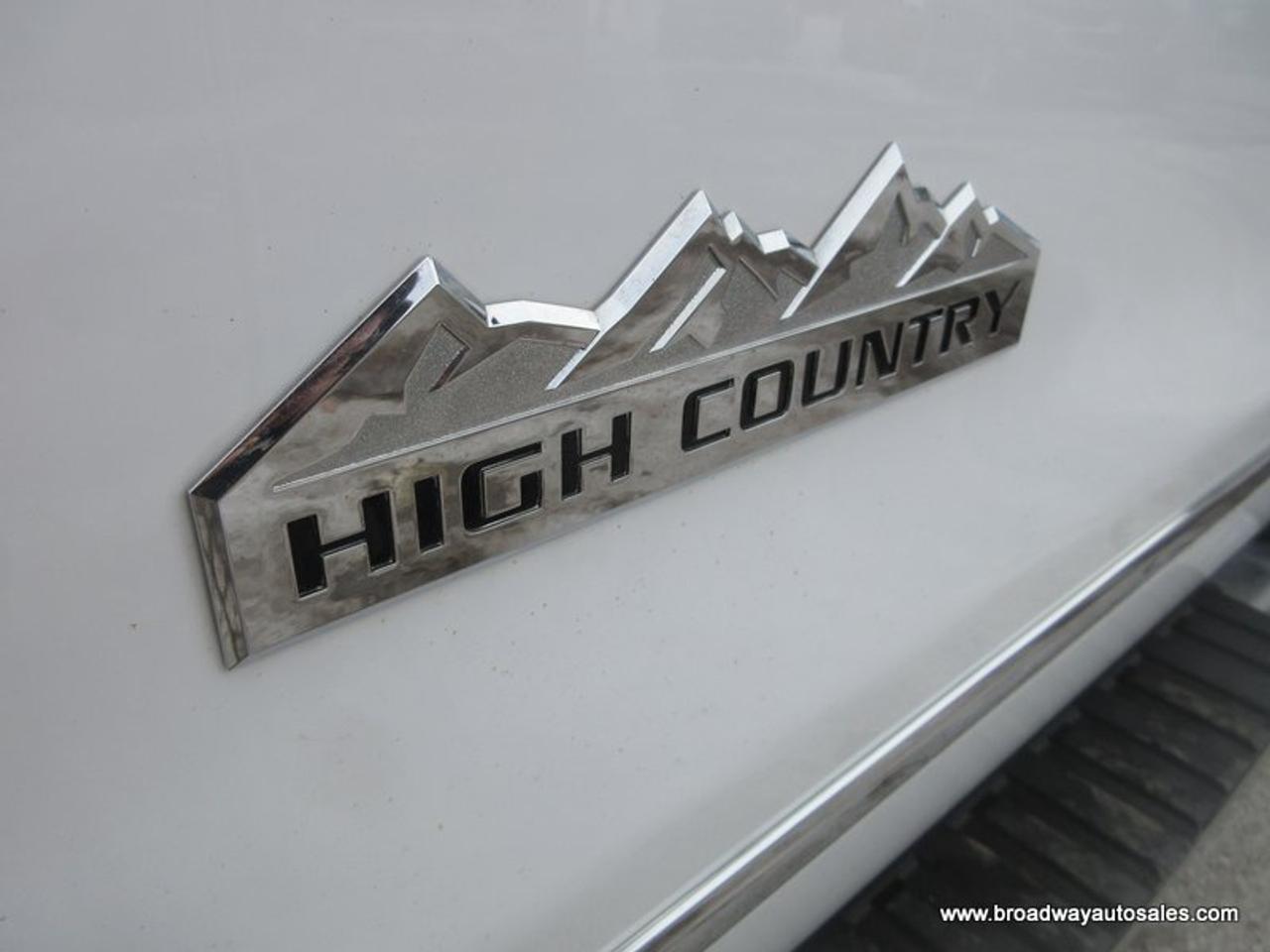 2015 Chevrolet Silverado 3500 1-TON HIGH-COUNTRY-MODEL 5 PASSENGER 6.6L - DURAMAX.. 4X4.. CREW-CAB.. 8-FOOT-DUALLY.. NAVIGATION.. POWER SUNROOF.. DVD PLAYERS.. HEATED/AC SEATS.. Photo