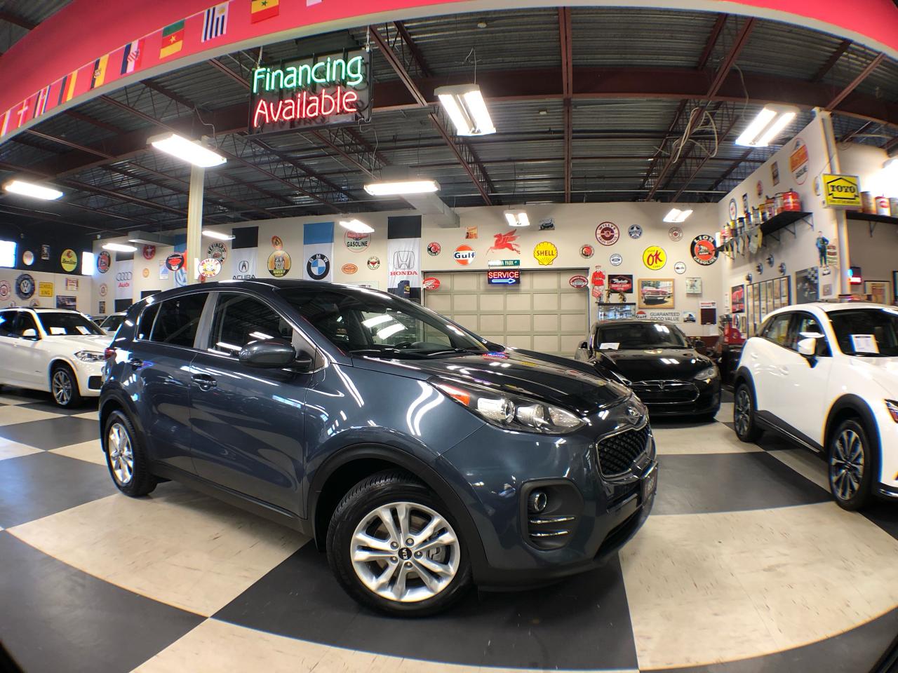 <p>SUV ......... AUTOMATIC ......... BACKUP CAMERA  ......... A/C ......... EMERGENCY BRAKE ........ USB PORTS ....... CRUISE CONTROL ......... TRACTION CONTROL ........ BLUETOOTH .......... HEATED SEATS ....... ALLOY WHEELS ....... HEATED STEERING ......... TPMS SYSTEM .......... KEYLESS ENTRY AND MUCH MORE ......<br /><br /><br />INTERESTED IN FINANCING THIS KIA SPORTAGE? WE INVITE ALL CREDIT TYPES TO APPLY:<br /><br />FAIR CREDIT  |  GOOD CREDIT  | EXCELLENT CREDIT<br />NO CREDIT  |  BAD CREDIT  |  NEW TO CANADA<br />CONSUMER PROPOSAL  |  BANKRUPTCY  | COLLECTIONS<br /><br /><br />**ZERO MONEY ($0) DOWN! NO PAYMENT FOR 6 MONTHS AVAILABLE O.A.C**........<br /><br /><br />VEHICLES ARE NOT DRIVEABLE IF NOT CERTIFIED AND NOT E-TESTED, CERTIFICATION PACKAGE IS AVAILABLE FOR $899 + TAX & LICENSING ARE EXTRA........<br /><br /><br />WE CAN HELP YOU FINANCE YOUR KIA IN 3 EASY STEPS:<br /><br /><br />1 -  CONTACT NEXCAR BY PHONE AT (416) 633-8188 OR EMAIL INFO@NEXCAR.CA<br /><br /><br />2 -  SPEAK AND MEET WITH OUR TEAM AT OUR INDOOR SHOWROOM LOCATED AT:<br />1235 FINCH AVE. W, TORONTO, ON M3J 2G4<br /><br /><br />3 - APPLY FOR FINANCING, FILL OUT OUR FORM HERE: NEXCAR.CA/FINANCE<br /><br /><br />OPEN 7 DAYS A WEEK........THIS KIA SPORTAGE IS WAITING FOR YOU IN OUR HEATED INDOOR SHOWROOM........WE TAKE PRIDE IN OUR SALES, CUSTOMER SERVICE AND PRE-OWNED VEHICLES........<br /><br /><br />ABOUT NEXCAR AUTO SALES  & LEASING:<br /><br /><br />We are a family-owned and operated business for more than 15 years. Any automotive vehicle make and model can be found inside our indoor showroom. Our sales and financing team always work around the clock to find and provide you with the best deal possible. We also have an internal auto services area with full-time mechanics to handle all your vehicle needs.<br /><br />WE’RE HONORED TO SERVE CUSTOMERS & CLIENTS ACROSS ONTARIO:<br /><br /><br />Greater Toronto Area, North Toronto, North York, Etobicoke, Scarborough, Mississauga, Oshawa, Vaughan, Richmond Hill, Markham, Stouffville, East Gwillimbury, Pickering, Ajax, Whitby, Hamilton, Burlington, Brampton, Waterloo, London, Goderich, Bayfield, Kincardine, Tobermory, Owen Sound, Keswick, Milton, Kitchener, Oakville, Niagara Falls, St. Catherines, Windsor, Bradford, Innisfil, Newmarket, Aurora, Georgina, Sutton, Kawartha, Port Perry, Peterborough, Kingston, Utica, Uxbridge, Ottawa, Kingston, Carleton Place, Barry’s Bay, Penetanguishene, Muskoka, Alliston, New Tecumseth. Sudbury, Thunder Bay, Sault Ste Marie.....<br /><br />DISCLAIMER: **ACCRUED INTEREST MUST BE PAID ON 6 MONTHS PAYMENT DEFERRAL.</p>