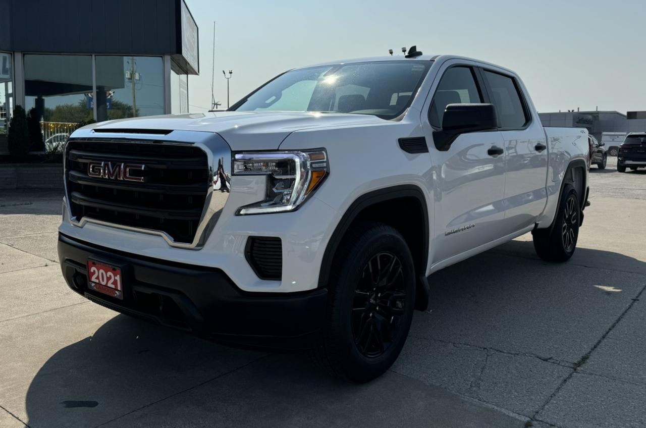 <p style=text-align: center;><span style=font-size: 18pt;><strong>2021 GMC SIERRA 1500 4WD CREW CAB 147</strong></span></p><p style=text-align: center;><span style=font-size: 18pt;><strong>2.7L TURBO I4 ENGINE</strong></span></p><p style=text-align: center;><span style=font-size: 14pt;>310 HORSEPOWER | 430 LB-FT OF TORQUE | REAR AXLE RATIO: 3.42</span></p><p style=text-align: center;><span style=font-size: 14pt;>TOWING CAPACITY: 8,900 LBS | PAYLOAD: 2,040 LBS | GVWR: 7,000 LBS</span></p><p style=text-align: center;><span style=font-size: 14pt;>10.7L/100KM HIGHWAY | 12.4L/100KM CITY | 11.8L/100KM COMBINED</span></p><p style=text-align: center;><span style=font-size: 18pt;><strong>8-SPEED AUTOMATIC TRANSMISSION</strong></span></p><p style=text-align: center;><span style=font-size: 18pt;><strong>20 GLOSS BLACK PAINTED ALUMINUM WHEELS</strong></span></p><p style=text-align: center;> </p><p style=text-align: center;> </p><p style=text-align: center;><span style=font-size: 14pt;><strong>CONNECTIVITY FEATURES</strong></span></p><p style=text-align: center;><span style=font-size: 14pt;>GMC Infotainment System with  7 Diagonal Colour Touch  Screen, Includes Bluetooth Audio Streaming for Music and Select Phones; Featuring  Apple Carplay & Android Auto Capability for Compatible Phones</span></p><p style=text-align: center;><span style=font-size: 14pt;><strong>MECHANICAL</strong></span></p><p style=text-align: center;><span style=font-size: 14pt;>8-Speed Automatic Transmission w/ Cruise & Powertrain Grade Braking and Tow/haul Mode, Autotrac Single Speed Transfer Case, Engine Oil Cooler, 4-wheel Antilock Disc Brakes with Duralife Rotors, Battery Run Down Protection</span></p><p style=text-align: center;><strong><span style=font-size: 18.6667px;>SAFETY / SECURITY</span></strong></p><p style=text-align: center;><span style=font-size: 14pt;>Rear Vision Camera, Teen Driver Mode, Stabilitrak(R) - Electronic  Stability Control System w/  Proactive Roll Avoidance, Traction Control, Trailer Sway Control & Hill Start Assist, Automatic Front Headlamp &  Rear Tail Lamp Control</span></p><p style=text-align: center;><span style=font-size: 14pt;><strong>EXTERIOR FEATURES</strong></span></p><p style=text-align: center;><span style=font-size: 14pt;>LED Headlamps w/ LED Signature Daytime Running Lamps, LED Tail Lamps, Front Recovery Hooks, Cargo Tie Downs (12), Fixed, Rated at 226.8 Kg (500 LBS), Cornerstep Rear Bumper, Top Bed Rail and Tailgate Protection Cap, Solar Absorbing Tinted Glass, Tire Carrier Lock, Variable Intermittent Wipers</span></p><p style=text-align: center;><span style=font-size: 14pt;><strong>INTERIOR FEATURES</strong></span></p><p style=text-align: center;><span style=font-size: 14pt;>Power Windows: Express Up & Down for Driver, Express Down for Front Passenger and Rear, Air Conditioning, Power Door Locks with Lockout Protection, Driver Information Centre, Tire Pressure Monitor with Tire Fill Alert (Excludes Spare Tire), 40/20/40 Split Bench Seat, Front Driver and Passenger 4-Way Seat Adjuster, Tilt Steering Wheel, Rear 60/40 Folding Bench Seat, Rear Air Vents for Heating/Cooling, Front A-Pillar Mounted Assist Handles, Driver and Passenger</span></p><p style=text-align: center;> </p><p style=text-align: center;><span style=font-size: 14pt;><strong>OPTIONAL EQUIPMENT</strong></span></p><p style=text-align: center;><span style=font-size: 14pt;><em><span style=text-decoration: underline;>Sierra Value Package:</span></em><br />Heated Outside Power Mirrors, Remote Keyless Entry, Power Lock and Release Tailgate with EZ Lift & Lower, Tinted Glass, LED Cargo Bed Lighting, Rear-Window Defogger, Cruise Control, </span><span style=font-size: 14pt;>Trailering Package: Trailer Hitch, 7 Pin and 4 Pin Connectors, Hitch Guidance</span></p><p style=text-align: center;><em><span style=text-decoration: underline;><span style=font-size: 14pt;>20 Gloss Black Painted Aluminum Wheels</span></span></em></p><p style=text-align: center;><em><span style=text-decoration: underline;><span style=font-size: 14pt;>Spray-on Bed Liner</span></span></em></p><p style=text-align: center;><em><span style=text-decoration: underline;><span style=font-size: 14pt;>Automatic Locking Rear Differential</span></span></em></p><p style=text-align: center;><span style=font-size: 14pt;><em><span style=text-decoration: underline;>Onstar:</span></em><br />Onstar Services Capable, 4G LTE Wi-Fi Hotspot Capable</span></p><p style=text-align: center;><em><span style=text-decoration: underline;><span style=font-size: 14pt;>Integrated Trailer Brake </span><span style=font-size: 14pt;>Controller</span></span></em></p><p style=text-align: center;><em><span style=text-decoration: underline;><span style=font-size: 14pt;>120V AC Power Outlets Mounted on the Instrument Panel and in the Pickup Box</span></span></em></p><p style=text-align: center;><em><span style=text-decoration: underline;><span style=font-size: 14pt;>Moulded Splash Guards</span></span></em></p><p style=text-align: center;><em><span style=text-decoration: underline;><span style=font-size: 14pt;>Engine Block Heater </span></span></em></p><p style=text-align: center;><em><span style=text-decoration: underline;><span style=font-size: 14pt;>Color Keyed Carpet</span></span></em></p><p style=text-align: center;><em><span style=text-decoration: underline;><span style=font-size: 14pt;>Air Conditioning, Semi-automatic</span></span></em></p><p style=text-align: center;><em><span style=text-decoration: underline;><span style=font-size: 14pt;>Siriusxm Radio Capable</span></span></em></p><p style=text-align: center;> </p><p style=text-align: center;> </p><p style=text-align: center;> </p><p style=box-sizing: border-box; margin-bottom: 1rem; margin-top: 0px; color: #212529; font-family: -apple-system, BlinkMacSystemFont, Segoe UI, Roboto, Helvetica Neue, Arial, Noto Sans, Liberation Sans, sans-serif, Apple Color Emoji, Segoe UI Emoji, Segoe UI Symbol, Noto Color Emoji; font-size: 16px; background-color: #ffffff; text-align: center; line-height: 1;><span style=box-sizing: border-box; font-family: arial, helvetica, sans-serif;><span style=box-sizing: border-box; font-weight: bolder;><span style=box-sizing: border-box; font-size: 14pt;>Here at Lanoue/Amfar Sales, Service & Leasing in Tilbury, we take pride in providing the public with a wide variety of High-Quality Pre-owned Vehicles. We recondition and certify our vehicles to a level of excellence that exceeds the Status Quo. We treat our Customers like family and provide the highest level of service from Start to Finish. If you’d like a smooth & stress-free car shopping experience, give one of our Sales Associates a call at 1-844-682-3325 to help you find your next NEW-TO-YOU vehicle!</span></span></span></p><p style=box-sizing: border-box; margin-bottom: 1rem; margin-top: 0px; color: #212529; font-family: -apple-system, BlinkMacSystemFont, Segoe UI, Roboto, Helvetica Neue, Arial, Noto Sans, Liberation Sans, sans-serif, Apple Color Emoji, Segoe UI Emoji, Segoe UI Symbol, Noto Color Emoji; font-size: 16px; background-color: #ffffff; text-align: center; line-height: 1;><span style=box-sizing: border-box; font-family: arial, helvetica, sans-serif;><span style=box-sizing: border-box; font-weight: bolder;><span style=box-sizing: border-box; font-size: 14pt;>Although we try to take great care in being accurate with the information in this listing, from time to time, errors occur. The vehicle is priced as it is physically equipped. Minor variances will not effect pricing. Please verify the vehicle is As Expected when you visit. Thank You!</span></span></span></p>