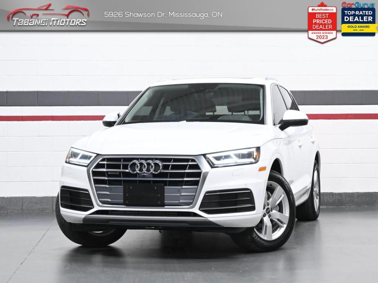 <b>Apple Carplay, Android Auto, 360 Camera, Bang & Olufsen Audio, Ambient Lighting, Digital Dash, Navigation, Panoramic Roof, Front & Rear Heated Seats, Heated Steering Wheel, Audi Pre Sense, Audi Side Assist, Park Aid!</b><br>  Tabangi Motors is family owned and operated for over 20 years and is a trusted member of the Used Car Dealer Association (UCDA). Our goal is not only to provide you with the best price, but, more importantly, a quality, reliable vehicle, and the best customer service. Visit our new 25,000 sq. ft. building and indoor showroom and take a test drive today! Call us at 905-670-3738 or email us at customercare@tabangimotors.com to book an appointment. <br><hr></hr>CERTIFICATION: Have your new pre-owned vehicle certified at Tabangi Motors! We offer a full safety inspection exceeding industry standards including oil change and professional detailing prior to delivery. Vehicles are not drivable, if not certified. The certification package is available for $595 on qualified units (Certification is not available on vehicles marked As-Is). All trade-ins are welcome. Taxes and licensing are extra.<br><hr></hr><br> <br>   Luxurious, stylish, and high-tech, this Audi Q5 is a solid everyday SUV. This  2020 Audi Q5 is for sale today in Mississauga. <br> <br>This 2020 Audi Q5 has gone through another batch of refinement, sporting all new components hidden away under the shapely body, and a refined interior, offering more room and excellent comfort, surrounding the passengers in a tech filled cabin that follows Audis new interior design language. This  SUV has 70,963 kms. Its  white in colour  . It has a 7 speed automatic transmission and is powered by a  248HP 2.0L 4 Cylinder Engine.  It may have some remaining factory warranty, please check with dealer for details.  This vehicle has been upgraded with the following features: Air, Rear Air, Tilt, Cruise, Power Windows, Power Locks, Power Mirrors. <br> <br>To apply right now for financing use this link : <a href=https://tabangimotors.com/apply-now/ target=_blank>https://tabangimotors.com/apply-now/</a><br><br> <br/><br>SERVICE: Schedule an appointment with Tabangi Service Centre to bring your vehicle in for all its needs. Simply click on the link below and book your appointment. Our licensed technicians and repair facility offer the highest quality services at the most competitive prices. All work is manufacturer warranty approved and comes with 2 year parts and labour warranty. Start saving hundreds of dollars by servicing your vehicle with Tabangi. Call us at 905-670-8100 or follow this link to book an appointment today! https://calendly.com/tabangiservice/appointment. <br><hr></hr>PRICE: We believe everyone deserves to get the best price possible on their new pre-owned vehicle without having to go through uncomfortable negotiations. By constantly monitoring the market and adjusting our prices below the market average you can buy confidently knowing you are getting the best price possible! No haggle pricing. No pressure. Why pay more somewhere else?<br><hr></hr>WARRANTY: This vehicle qualifies for an extended warranty with different terms and coverages available. Dont forget to ask for help choosing the right one for you.<br><hr></hr>FINANCING: No credit? New to the country? Bankruptcy? Consumer proposal? Collections? You dont need good credit to finance a vehicle. Bad credit is usually good enough. Give our finance and credit experts a chance to get you approved and start rebuilding credit today!<br> o~o