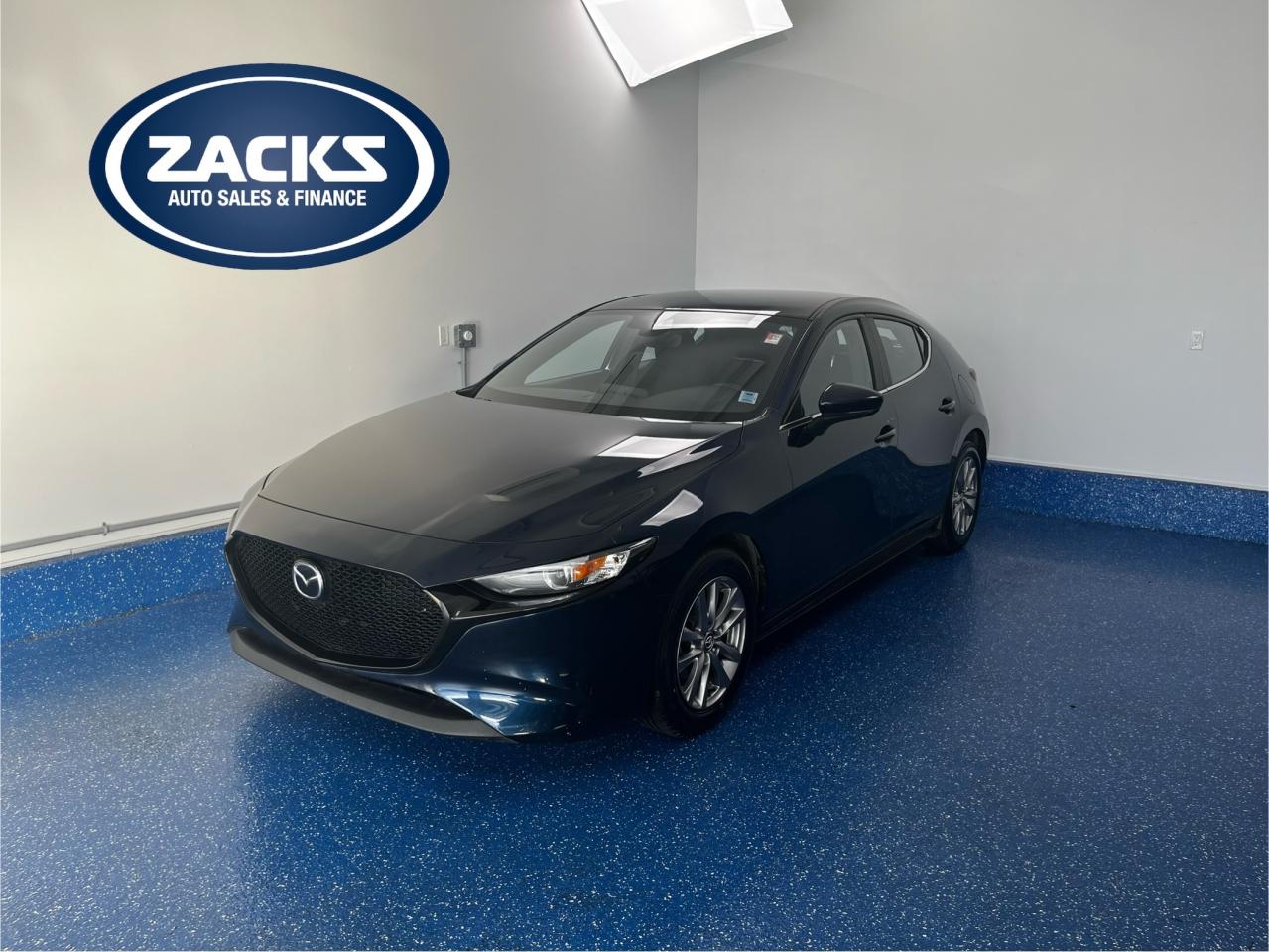 New Price! 2019 Mazda Mazda3 GS GS | Low Kms | Zacks Certified. 6-Speed Automatic FWD Blue I4<br>Odometer is 7001 kilometers below market average!<br><br>ABS brakes, Active Cruise Control, Air Conditioning, Alloy wheels, AppLink/Apple CarPlay and Android Auto, Automatic temperature control, Compass, Electronic Stability Control, Exterior Parking Camera Rear, Front dual zone A/C, Heated door mirrors, Heated Front Bucket Seats, Heated front seats, Heated steering wheel, Illuminated entry, Low tire pressure warning, Package AA00, Power windows, Radio: AM/FM/HD Audio System, Remote keyless entry, Tilt steering wheel, Traction control, Turn signal indicator mirrors, Wheels: 16 Silver Metallic Finish Alloy.<br><br>Certification Program Details: Fully Reconditioned | Fresh 2 Yr MVI | 30 day warranty* | 110 point inspection | Full tank of fuel | Krown rustproofed | Flexible financing options | Professionally detailed<br><br>This vehicle is Zacks Certified! Youre approved! We work with you. Together well find a solution that makes sense for your individual situation. Please visit us or call 902 843-3900 to learn about our great selection.<br><br>With 22 lenders available Zacks Auto Sales can offer our customers with the lowest available interest rate. Thank you for taking the time to check out our selection!