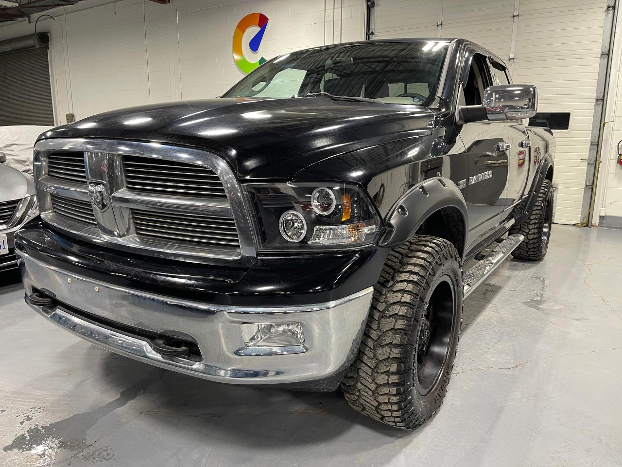 2012 RAM 1500 4WD QUAD CAB 140.5" BIG HORN