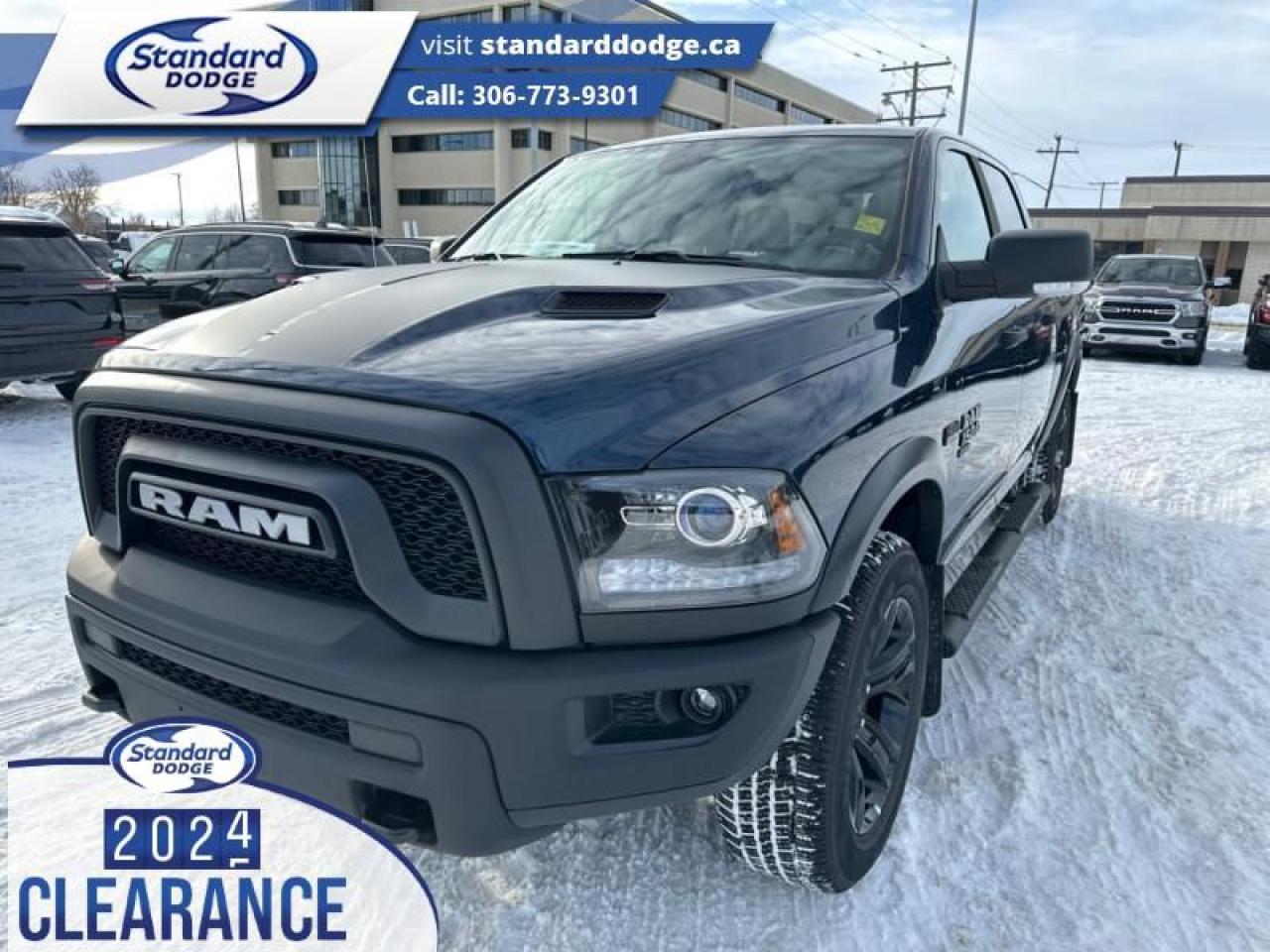 <b>Mopar Sport Performance Hood, Heated Seats, Luxury Group, Remote Engine Start, Spray in Bedliner!</b><br> <br> <br> <br>  Get the job done right with this rugged Ram 1500 Classic pickup. <br> <br>The reasons why this Ram 1500 Classic stands above its well-respected competition are evident: uncompromising capability, proven commitment to safety and security, and state-of-the-art technology. From its muscular exterior to the well-trimmed interior, this 2024 Ram 1500 Classic is more than just a workhorse. Get the job done in comfort and style while getting a great value with this amazing full-size truck. <br> <br> This patriot blue pearl coat Crew Cab 4X4 pickup   has a 8 speed automatic transmission and is powered by a  395HP 5.7L 8 Cylinder Engine.<br> <br> Our 1500 Classics trim level is Warlock.  This vehicle has been upgraded with the following features: Mopar Sport Performance Hood, Heated Seats, Luxury Group, Remote Engine Start, Spray In Bedliner, Trailer Hitch. <br><br> View the original window sticker for this vehicle with this url <b><a href=http://www.chrysler.com/hostd/windowsticker/getWindowStickerPdf.do?vin=1C6RR7LT0RS192038 target=_blank>http://www.chrysler.com/hostd/windowsticker/getWindowStickerPdf.do?vin=1C6RR7LT0RS192038</a></b>.<br> <br>To apply right now for financing use this link : <a href=https://standarddodge.ca/financing target=_blank>https://standarddodge.ca/financing</a><br><br> <br/><br>* Visit Us Today *Youve earned this - stop by Standard Chrysler Dodge Jeep Ram located at 208 Cheadle St W., Swift Current, SK S9H0B5 to make this car yours today! <br> Pricing may not reflect additional accessories that have been added to the advertised vehicle<br> o~o