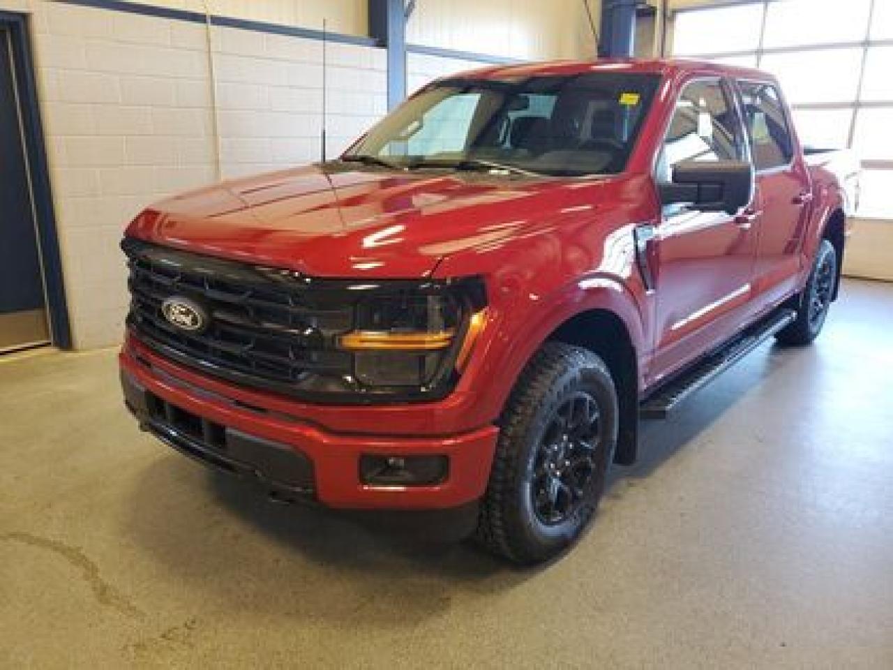 This all new, full sized 2024 Ford F-150 XLT 302A looks absolutely stunning in Rapid Red. This pick up comes with the 3.5L EcoBoost engine. This remarkable engine not only produces 400 horsepower and 500 ft pounds of torque, but by leveraging the EcoBoost technology and a 10-speed automatic transmission this truck is rated it to get 12.3L 100/km (23 miles per gallon) combined highway/city fuel economy. This truck can tow up to a massive amount of 13,200 pounds!

Key Features:
Adaptive Cruise Control 
Lane Centering 
Heated Front Seats
Lane Keeping System 
Rear View Camera 
6 Black Running Boards 
Auto Dimming Rearview Mirror 
360 Degree Camera 
Pro Trailer Backup Assist 
Pro Trailer Hitch Assist 
Dual Exhaust 
Reverse Sensing System 
Reverse Brake Assist 
12 LCD Touchscreen 
Apple Car Play / Android Auto 
Rear Window Defroster 
18 Black Painted Aluminum Wheels 
Hill Start Assist 
Class IV Trailer Hitch 
XLT Black Appearance Package
 -275/65R18 BSW All Terrain
 -18 Gloss Black Aluminum Wheels
Engine Block Heater
Skid Plates

At Moose Jaw Ford, we're driving change all across Saskatchewan! We are Moose Jaw's prime destination for everything automotive. We pride ourselves by consistently providing the highest quality customer experience  every single time. Because of this commitment, and the love of what we do, Moose Jaw Ford is the recipient of multiple President's Club Awards and is recognized as one of Canada's Best Managed Companies. We are dedicated to building long lasting relationships. You can trust that our trained service technicians will take excellent care of you and your vehicle when you visit our service department. Come visit us today at 1010 North Service Road..