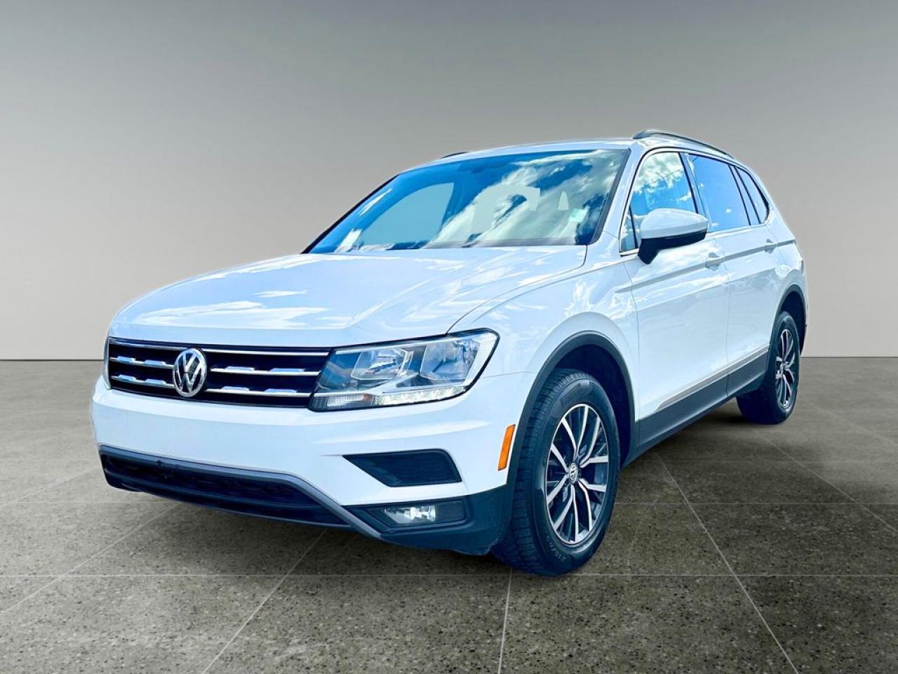 <b>Pedestrian Monitoring,  Power Liftgate,  17 inch Tulsa Alloy Wheels,  Autonomous Emergency Braking,  Blind Spot Detection!</b><br> <br>    Among crossover SUVs, this 2019 Volkswagen Tiguan stands out for its spacious and elegant interior. This  2019 Volkswagen Tiguan is for sale today. <br> <br>The weekend warrior! As one of the most minimalist styled crossover SUVs, the Tiguan is the winner of elegance in its competition. Crisp lines, a luxurious ride quality and the largest interior within its class give this Tiguan the high marks as the leader of the crossover SUV segment.This  SUV has 126,856 kms. Its  white in colour  . It has a 8 speed automatic transmission and is powered by a  184HP 2.0L 4 Cylinder Engine.  <br> <br> Our Tiguans trim level is Comfortline 4MOTION. Upgrade to this Volkswagen Tiguan Comfortline that really means comfort with full time all wheel drive, LED brake lights, body colored heated side mirrors with turn signals, elegant alloy wheels, rain detecting wipers with heated jets, a 6 speaker stereo with an 8 inch display, App-Connect smartphone integration, power liftgate, front adjustable bucket seats, proximity keyless entry and push button start, cruise control, dual zone front automatic air conditioning, an auto dimming rear view mirror, a leather wrapped multi-functional steering wheel, Bluetooth connectivity, front and rear cup holders, a rear view camera blind spot detection sensor, pedestrian detection, front collision prevention assist with autonomous emergency braking and much more. This vehicle has been upgraded with the following features: Pedestrian Monitoring,  Power Liftgate,  17 Inch Tulsa Alloy Wheels,  Autonomous Emergency Braking,  Blind Spot Detection,  Kessy -keyless Access,  Push Button Start. <br> <br/><br> Buy this vehicle now for the lowest bi-weekly payment of <b>$156.84</b> with $0 down for 84 months @ 5.99% APR O.A.C. ( Plus applicable taxes -  Plus applicable fees   ).  See dealer for details. <br> <br><br> We know that you have high expectations, and as car dealers, we enjoy the challenge of meeting and exceeding those standards each and every time. Allow us to demonstrate our commitment to excellence! </br>

<br> As your one stop shop for quality pre owned vehicles and hassle free auto financing in Saskatoon, we provide the following offers & incentives for our valued clients in Saskatchewan, Alberta & Manitoba. </br> o~o