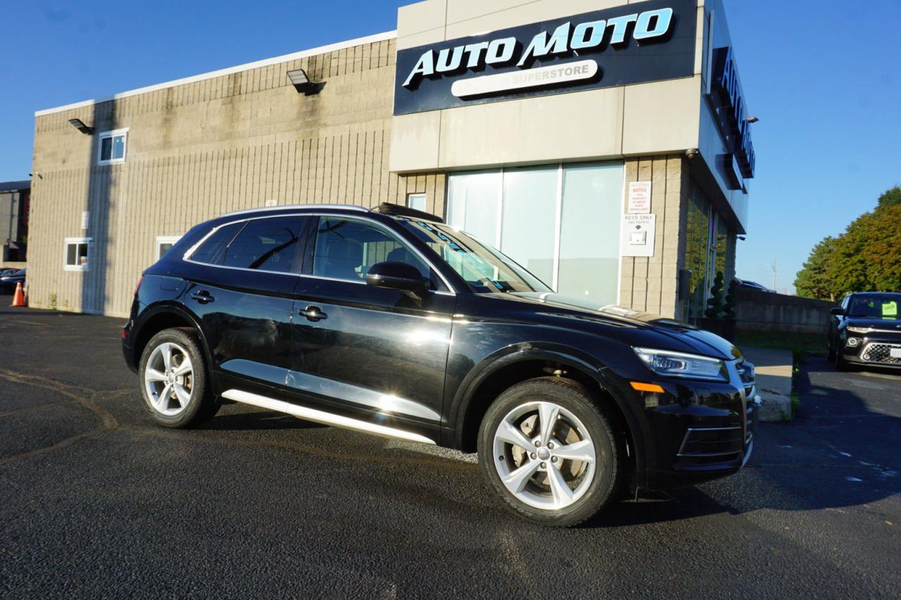 <div>*LOCAL ONTARIO CAR*CERTIFIED<span>* </span><span>Very Clean Audi Q5 </span><span>PROGRESSIV</span><span> 2.0L TURBO 4Cyl Quattro AWD with Automatic Transmission. Black on Black Leather Interior. Fully Loaded with: Power Windows, Power Locks, Power Heated Mirrors, CD/AUX, Fog lights, AC, Alloys, Heated Leather Front Seats,  Front and Reverse Parking Sensors, Keyless Entry, Steering Mounted Controls, Dual Power Front Seats, Power Tail Gate, Bluetooth, Roof Rack,</span><span> Navigation System, Back Up Camera, Push to Start, Wood Interior, Push to Start, Heated Steering Wheel, Blind Spot Indicators, Side Turning Signals, Shifter Paddles and ALL THE POWER OPTIONS!! </span></div><pre><p><span>-------------------------------------------------</span><br /><span>Financing options are available start from 6.99% with $0 Down payment O.A.C.</span><br /><span>-------------------------------------------------</span><br /><span>SAFETY CERTIFICATION INCLUDED*** Vehicle comes with: Safety Certification, and Car Fax Report ALL INCLUDED!! At no extra cost to you!! Dont miss this opportunity to own a high-quality, pre-owned vehicle. </span><br /><span>-------------------------------------------------</span><br /><br /><span>Additionally, our vehicles qualify for up to 4 years of extended warranty. Please speak to your sales representative for more information.</span><br /><span>-------------------------------------------------</span><br /><span>We are open Monday to Saturday from 10am - 6pm, Sundays Closed.</span><br /><span>-------------------------------------------------</span><br /><br /><span>We also welcome trade-ins, with on-site buyers available to estimate your vehicle on the same day.</span><br /><span>-------------------------------------------------</span><br /><br /><span>Visit us at 3219 Harvester Road, Burlington, L7N 3N8 or call us at Nine O Five-281-2255 for more information.</span><br /><span>------------------------------------------------</span><br /><span>Check our inventory at www automotoinc ca</span></p></pre>