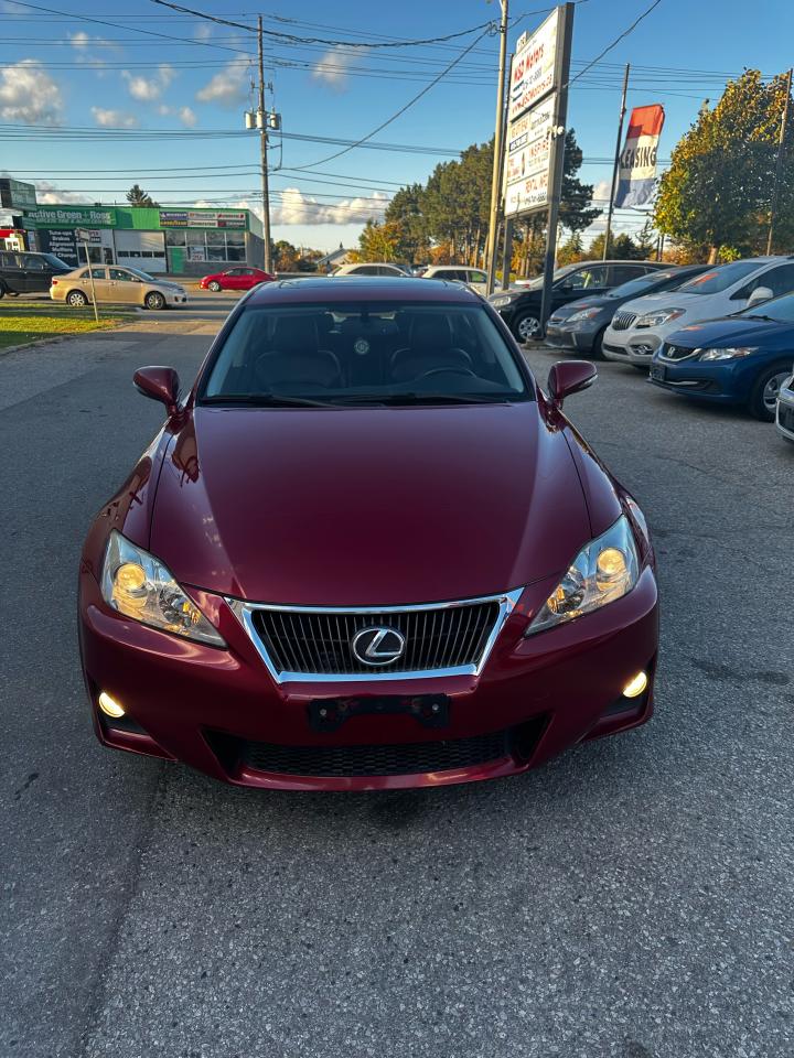 <p>Step into luxury and performance with this sleek 2012 Lexus IS 250, available now at Simplify Automotive Sales Inc. This stunning red sedan boasts a powerful 2.7L 6-cylinder engine paired with an automatic transmission and all-wheel drive, delivering both thrilling acceleration and confident handling. The black leather interior pampers you with heated and power-adjustable seats, a premium sound system, and a host of convenience features, including push-button start, keyless entry, and a sunroof.</p><p>With its stylish design and an impressive array of standard features, this Lexus IS 250 offers an exceptional driving experience. The 156,535km on the odometer speak to its well-maintained history, and youll find a range of safety features, including anti-lock brakes, stability control, and multiple airbags, to keep you secure on the road.</p><p>Here are five features that will make this Lexus IS 250 stand out:</p><ol><li><strong>All-Wheel Drive:</strong> Enjoy confident handling and peace of mind in any weather condition.</li><li><strong>Heated Seats:</strong> Stay cozy and comfortable even on the coldest days.</li><li><strong>Push Button Start:</strong> Experience the convenience of effortless ignition.</li><li><strong>Leather Seats:</strong> Indulge in the luxurious feel and comfort of premium leather.</li><li><strong>Sunroof:</strong> Let the sunshine in and enjoy the open-air feeling.</li></ol><p>Visit Simplify Automotive Sales Inc. today to experience the luxury and performance of this 2012 Lexus IS 250 firsthand.</p><p><em>Powered by AutoIntelligence™ AI</em></p>