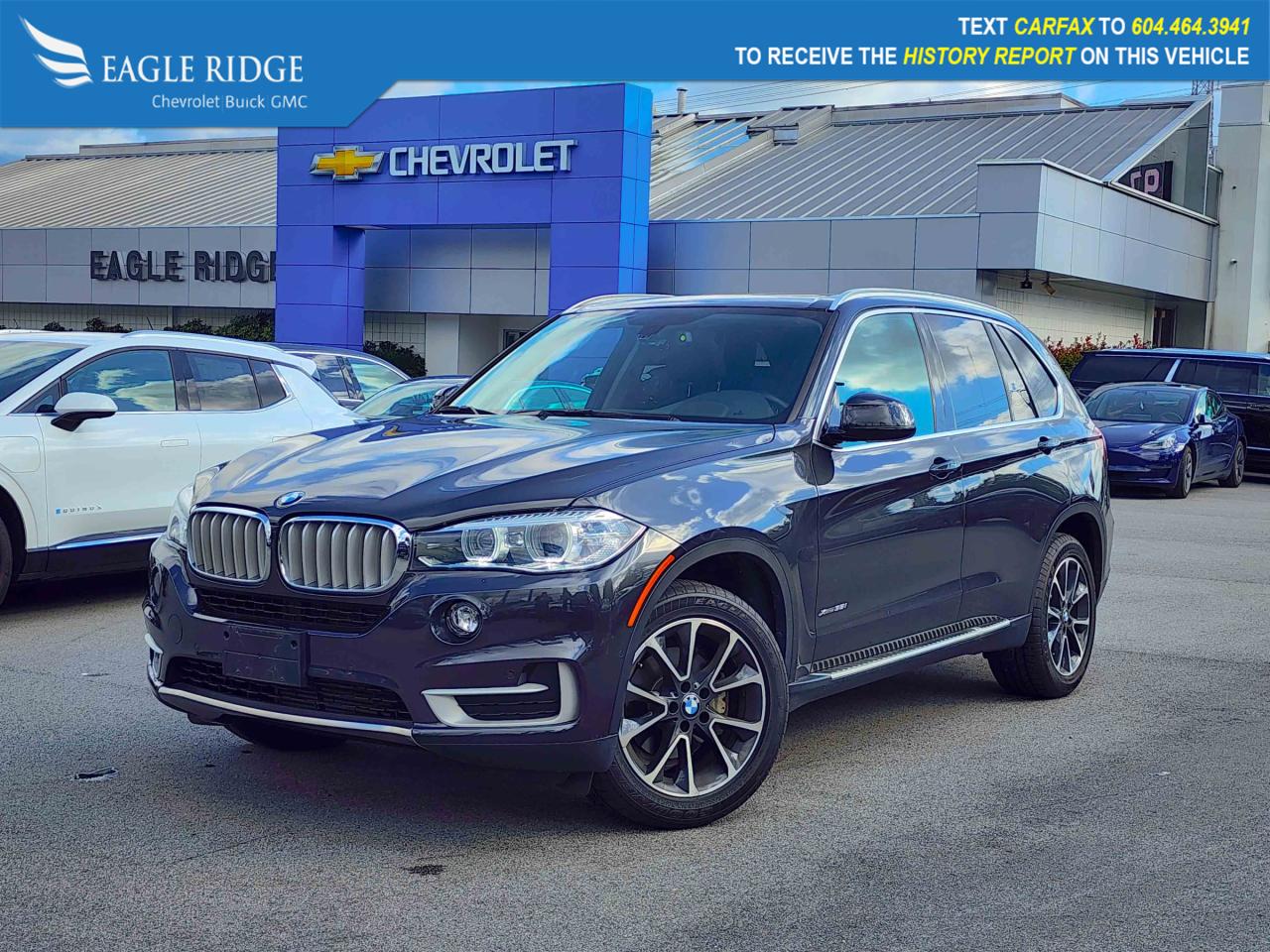 2018 BMW X5 Dakota Leather Upholstery, Delay-off headlights, Electric Seats w/Driver Memory, Electronic Stability Control, Exterior Parking Camera Rear, Four wheel independent suspension, Front fog lights, Heated door mirrors, Memory seat, Navigation System, Power adjustable front head restraints, Power driver seat, Power moonroof, Power steering, Power windows, Rear anti-roll bar, Remote keyless entry, Roof rack: rails only, Speed control, Speed-sensing steering, Spoiler, Steering wheel memory, Steering wheel mounted A/C controls, Steering wheel mounted audio controls, Traction control, Turn signal indicator mirrors. Gray 4D Sport Utility AWD 8-Speed Automatic 3.0L I6 DOHC 24V TwinPower Turbo

Eagle Ridge GM in Coquitlam is your Locally Owned & Operated Chevrolet, Buick, GMC Dealer, and a Certified Service and Parts Center equipped with an Auto Glass & Premium Detail. Established over 30 years ago, we are proud to be Serving Clients all over Tri Cities, Lower Mainland, Fraser Valley, and the rest of British Columbia. Find your next New or Used Vehicle at 2595 Barnet Hwy in Coquitlam. Price Subject to $595 Documentation Fee. Financing Available for all types of Credit.