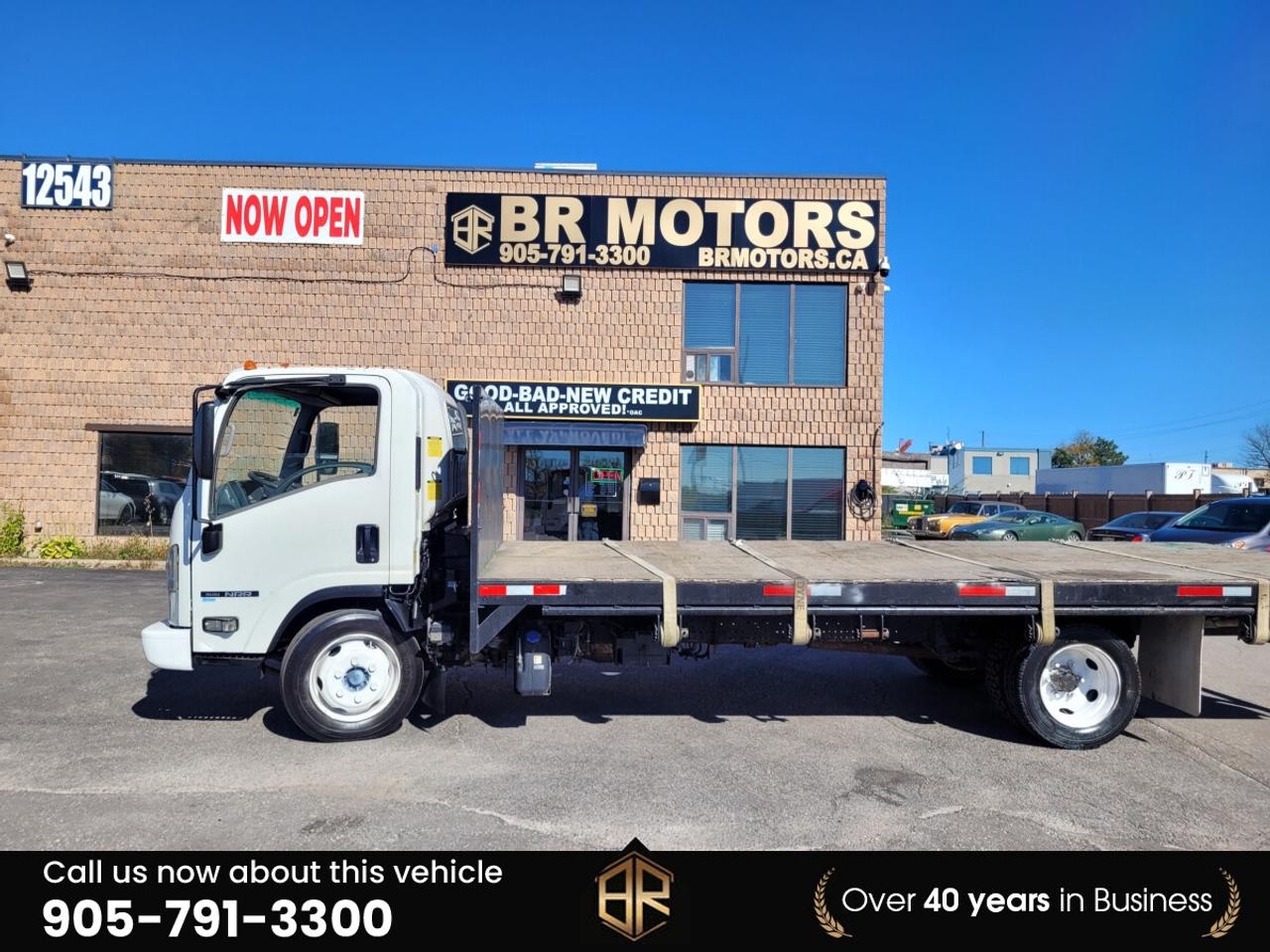 2013 Isuzu NRR Flat Bed | Diesel | Low Km's Photo