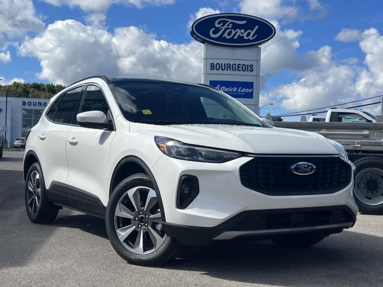 <b>Sunroof, Class II Trailer Tow Package!</b><br> <br> <br> <br>  Greetings. <br> <br><br> <br> This star white metallic tri-coat SUV  has a 8 speed automatic transmission and is powered by a  250HP 2.0L 4 Cylinder Engine.<br> <br> Our Escapes trim level is Platinum. This Escape Platinum is a significant step up, with upgrades such as inbuilt navigation, adaptive cruise control, a surround camera system and evasive steering assist. The amazing standard features continue with heated ActiveX synthetic leather seats, a heated leatherette steering wheel, simulated wood interior trim, remote engine start, and an expansive 13.2-inch infotainment screen with wireless Apple CarPlay and Android Auto, SiriusXM satellite radio, and FordPass Connect 4G mobile hotspot internet access. Safety features include blind spot detection, lane keeping assist with lane departure warning, evasive steering assist, forward and rear collision mitigation, and front and rear parking sensors. Additional features include a power liftgate for rear cargo access, aluminum wheels, roof rack rails, LED headlights with automatic high beams, a keypad for extra security, and so much more. This vehicle has been upgraded with the following features: Sunroof, Class Ii Trailer Tow Package. <br><br> View the original window sticker for this vehicle with this url <b><a href=http://www.windowsticker.forddirect.com/windowsticker.pdf?vin=1FMCU9JA8SUA00803 target=_blank>http://www.windowsticker.forddirect.com/windowsticker.pdf?vin=1FMCU9JA8SUA00803</a></b>.<br> <br>To apply right now for financing use this link : <a href=https://www.bourgeoismotors.com/credit-application/ target=_blank>https://www.bourgeoismotors.com/credit-application/</a><br><br> <br/> 5.99% financing for 84 months.  Incentives expire 2024-12-02.  See dealer for details. <br> <br>Discount on vehicle represents the Cash Purchase discount applicable and is inclusive of all non-stackable and stackable cash purchase discounts from Ford of Canada and Bourgeois Motors Ford and is offered in lieu of sub-vented lease or finance rates. To get details on current discounts applicable to this and other vehicles in our inventory for Lease and Finance customer, see a member of our team. </br></br>Discover a pressure-free buying experience at Bourgeois Motors Ford in Midland, Ontario, where integrity and family values drive our 78-year legacy. As a trusted, family-owned and operated dealership, we prioritize your comfort and satisfaction above all else. Our no pressure showroom is lead by a team who is passionate about understanding your needs and preferences. Located on the shores of Georgian Bay, our dealership offers more than just vehiclesits an experience rooted in community, trust and transparency. Trust us to provide personalized service, a diverse range of quality new Ford vehicles, and a seamless journey to finding your perfect car. Join our family at Bourgeois Motors Ford and let us redefine the way you shop for your next vehicle.<br> Come by and check out our fleet of 70+ used cars and trucks and 180+ new cars and trucks for sale in Midland.  o~o