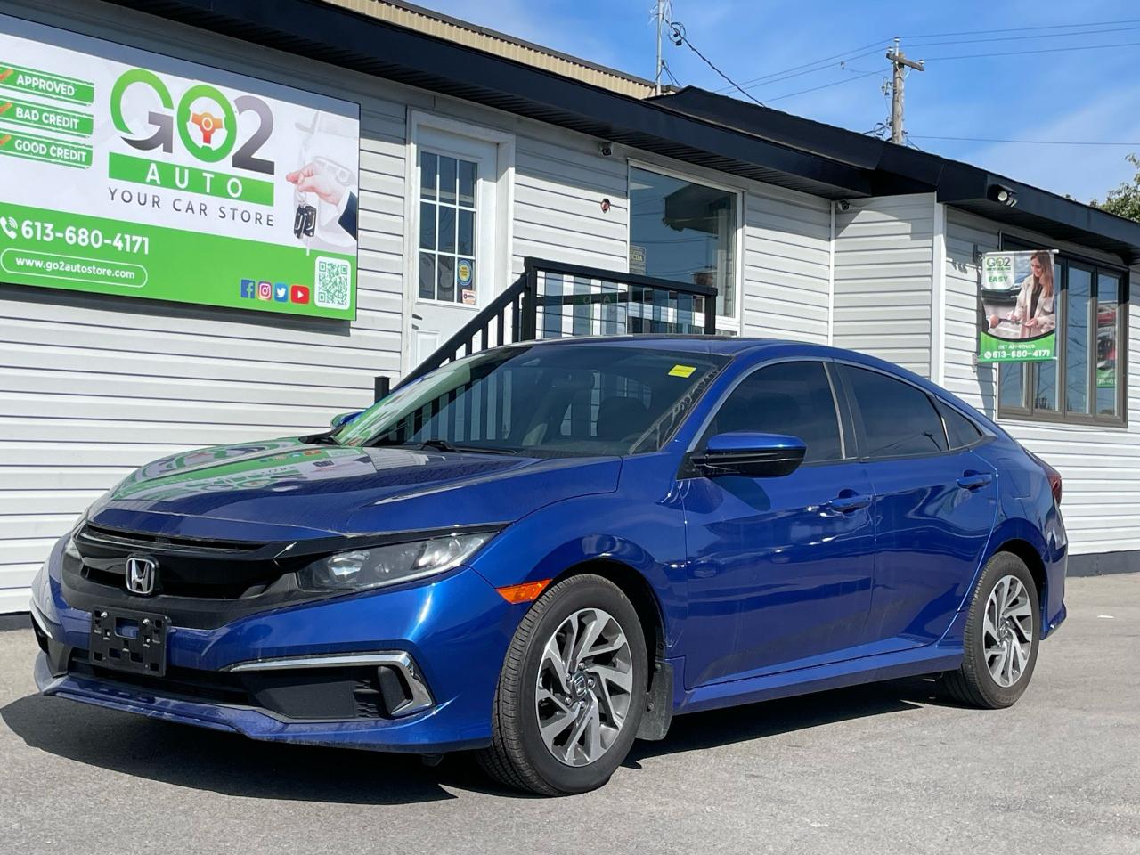 <p>Looking for a reliable and stylish sedan thats perfect for your daily commute and weekend adventures? Look no further than this 2020 Honda Civic EX, available now at GO2 Auto. This sleek blue beauty boasts a spacious and comfortable black interior with just 88,288km on the odometer.</p><p>This Civic EX comes packed with features designed to enhance your driving experience. From the convenience of keyless entry and start to the peace of mind offered by advanced safety features like lane departure warning and lane keeping assist, this car has it all. Enjoy the comfort of heated front seats on chilly mornings and stay connected with the integrated AM/FM radio and auxiliary audio input.</p><p>Five features that truly make this Civic EX stand out are:</p><ol><li><strong>Heated Front Seats:</strong> Stay warm and cozy even on the coldest days.</li><li><strong>Lane Departure Warning and Lane Keeping Assist:</strong> Drive with confidence knowing that the car will alert you if you drift out of your lane.</li><li><strong>Keyless Entry and Start:</strong> Say goodbye to fumbling for your keys.</li><li><strong>Remote Engine Start:</strong> Warm up your car on cold mornings from the comfort of your home.</li><li><strong>Power Driver Seat:</strong> Find the perfect driving position with ease.</li></ol><p>Ready to experience the Honda Civic EX for yourself? Visit GO2 Auto today!</p><p> </p>