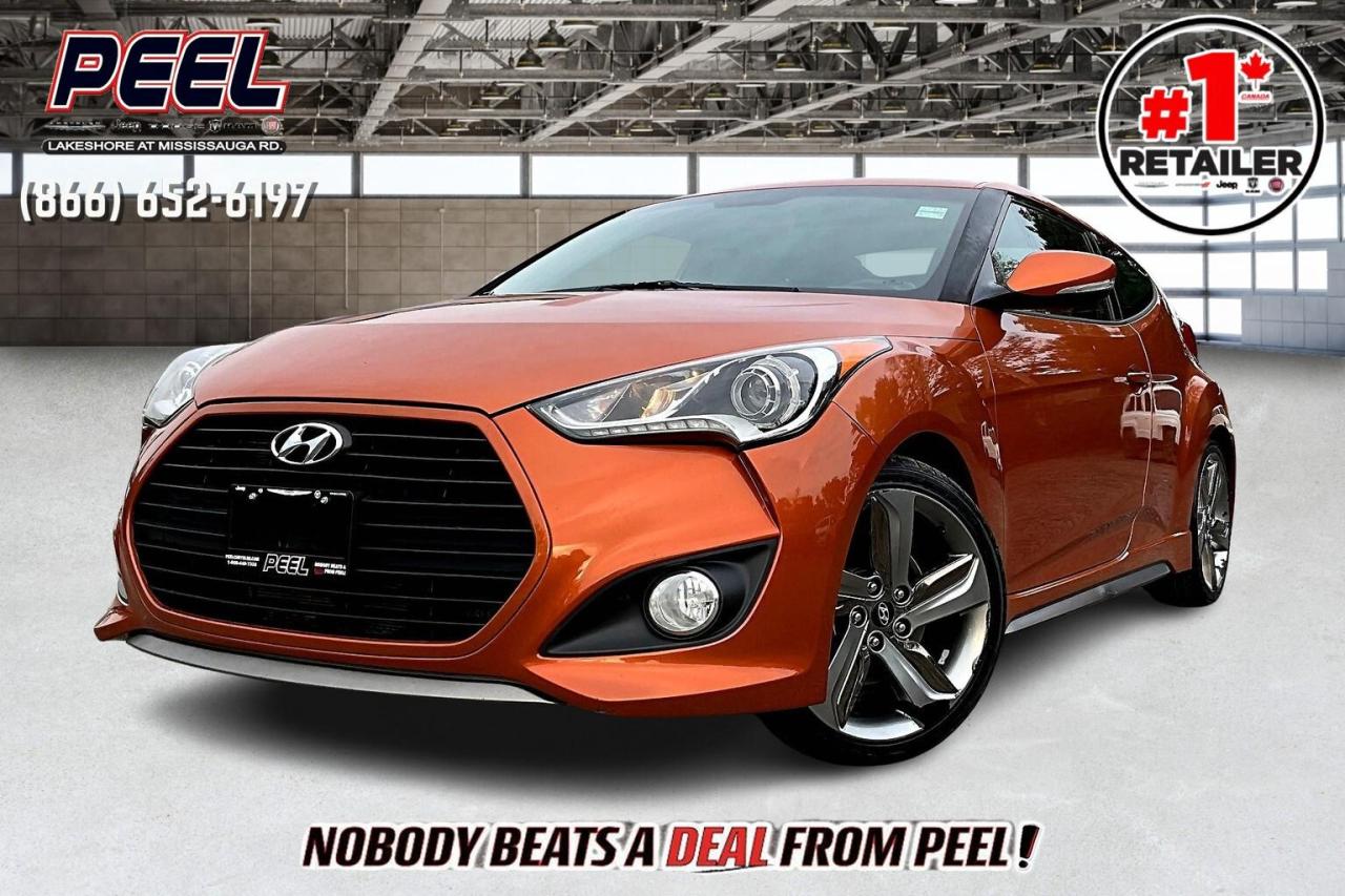 COME SEE WHY NOBODY BEATS A DEAL FROM PEEL! Your Source for ALL make and models used cars and trucks. Canadas #1 Stellantis Retailer for 8 years & counting!!

2015 Hyundai Veloster Turbo Hatchback FWD | 1.6L Turbo I-4 | Vitamin C Pearl | Heated Leather Bucket Seats | Power Sunroof | Dimension Premium Audio System | Heated Steering Wheel | Navigation | Parking Sensors | 18" Sport Alloy Wheels

One Owner Clean Carfax

The 2015 Hyundai Veloster Turbo Hatchback in Vitamin C Pearl is a fun, performance-focused car designed for those who enjoy a thrilling drive. Powered by a 1.6L Turbocharged I-4 engine, this hatchback delivers an engaging driving experience. Inside, heated leather bucket seats, a heated steering wheel, and a power sunroof provide comfort and convenience. The Dimension Premium Audio System and navigation keep you connected, while parking sensors and 18" sport alloy wheels add functionality and style. With a clean Carfax, this Veloster is ready for all seasons.
______________________________________________________

Engage & Explore with Peel Chrysler: Whether youre inquiring about our latest offers or seeking guidance, 1-866-652-6197 connects you directly. Dive deeper online or connect with our team to navigate your automotive journey seamlessly.

WE TAKE ALL TRADES & CREDIT. WE SHIP ANYWHERE IN CANADA! OUR TEAM IS READY TO SERVE YOU 7 DAYS!
______________________________________________________

*FREE CarFax (click the link above to check it out at no cost to you!)*

*FULLY CERTIFIED! (Have you seen some of these other dealers stating in their advertisements that certification is an additional fee? NOT HERE! Our certification is already included in our low sale prices to save you more!)

______________________________________________________

Peel Chrysler  A Trusted Destination: Based in Port Credit, Ontario, we proudly serve customers from all corners of Ontario and Canada including Toronto, Oakville, North York, Richmond Hill, Ajax, Hamilton, Niagara Falls, Brampton, Thornhill, Scarborough, Vaughan, London, Windsor, Cambridge, Kitchener, Waterloo, Brantford, Sarnia, Pickering, Huntsville, Milton, Woodbridge, Maple, Aurora, Newmarket, Orangeville, Georgetown, Stouffville, Markham, North Bay, Sudbury, Barrie, Sault Ste. Marie, Parry Sound, Bracebridge, Gravenhurst, Oshawa, Ajax, Kingston, Innisfil and surrounding areas. On our website www.peelchrysler.com, you will find a vast selection of new vehicles including the new and used Ram 1500, 2500 and 3500. Chrysler Grand Caravan, Chrysler Pacifica, Jeep Cherokee, Wrangler and more. All vehicles are priced to sell. We deliver throughout Canada. website or call us 1-866-652-6197. 

Your Journey, Our Commitment: Beyond the transaction, Peel Chrysler prioritizes your satisfaction. While many of our pre-owned vehicles come equipped with two keys, variations might occur based on trade-ins. Regardless, our commitment to quality and service remains steadfast. Experience unmatched convenience with our nationwide delivery options. All advertised prices are for cash sale only. Optional Finance and Lease terms are available. A Loan Processing Fee of $499 may apply to facilitate selected Finance or Lease options. If opting to trade an encumbered vehicle towards a purchase and require Peel Chrysler to facilitate a lien payout on your behalf, a Lien Payout Fee of $299 may apply. Contact us for details. Peel Chrysler Pre-Owned Vehicles come standard with only one key.