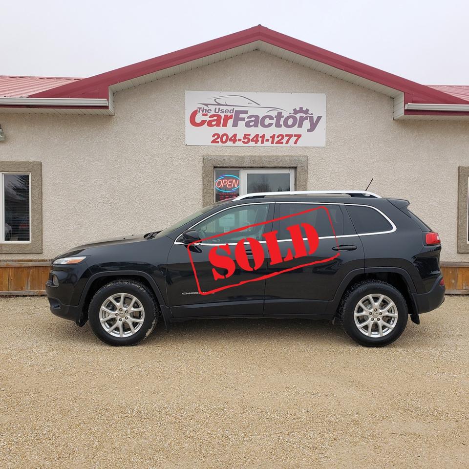 <p>****SOLD*****</p><p>Looking for a reliable and rugged SUV that can handle any adventure? Look no further than this 2015 Jeep Cherokee 4WD North 3.2L V6, Heated Seats, available at The Used Car Factory. With its sleek black exterior and spacious black interior, this Cherokee is ready to turn heads. The 3.2L V6 engine delivers a powerful and smooth ride, while the 4-wheel drive system gives you the confidence to conquer any terrain.</p><p>This well-maintained Jeep comes equipped with a variety of features designed to enhance your driving experience. From heated seats and a heated steering wheel to keep you warm on chilly mornings, to a rearview camera and a security system for your peace of mind, this Cherokee has everything you need to stay comfortable and safe on the road.</p><p>The Used Car Factory offers a wide range of used vehicles, and this Cherokee is no exception. With its 172,805km on the odometer, it has plenty of life left in it. Dont miss out on this incredible opportunity to own a rugged and versatile SUV.</p><p><strong>Here are 5 of its most sizzle-worthy features:</strong></p><ul><li><strong>4-Wheel Drive:</strong> Take on any terrain with confidence thanks to the powerful 4-wheel drive system.</li><li><strong>Heated Seats and Steering Wheel:</strong> Stay warm and cozy during your commute, even on the coldest days.</li><li><strong>Rearview Camera:</strong> Enjoy increased visibility and peace of mind when reversing.</li><li><strong>Heated Mirrors:</strong> Keep your view clear in all weather conditions.</li><li><strong>Leather Steering Wheel:</strong> Experience a premium feel and added comfort.</li></ul><p>We offer on -the- spot financing; we finance all levels of credit.</p><p>Comes with a 6 month Warranty at no extra cost, several upgrade options available.</p><p>All our vehicles come with a Manitoba safety.</p><p>Proud members of The Manitoba Used Car Dealer Association as well as the Manitoba Chamber of Commerce.</p><p>All payments, and prices, are plus applicable taxes. The Used Car Factorys Dealers permit is #4821</p>