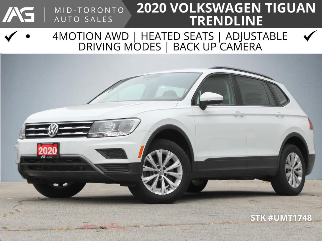 <h1>2020 Volkswagen Tiguan Overview</h1><p>4Motion AWD, heated seats, adjustable driving modes for different types of terrain, back up camera.<br />The 2020 Volkswagen Tiguan is a versatile compact SUV that combines modern design with impressive performance. Designed for comfort and utility, it is an ideal vehicle for families or adventurers who seek reliability and style.<br />Come see it today, No Haggles, No hassles, Simply Our Best Price Up Front. Peace of mind 7 Days or 300 Km EXCHANGE POLICY, will help you to make a worry-free decision. Our vehicle reconditioning standards exceed Ontario Safety standards to give you peace of mind. We Will Help You to Find A Right Car For You And Family Members. Flexible Lease or Low-Rate Financing Available, Please Submit Your Application for System Approval, Proper Warranties and Coverages Available, Please Call or E-mail for More info. Or You Can Visit Us At 2401 Dufferin St, Toronto, M6E 3S7, you can always call us during business hours at 416-840-3292</p><h2>Trim Level: Trendline 4Motion</h2><p>The Tiguan comes in the Trendline 4Motion trim, which offers a host of features designed for both convenience and comfort. Notable highlights include:</p><ul><li>Heated seats to ensure a cozy ride in colder weather</li><li>Adjustable driving modes that allow customization for different types of terrain, enhancing the driving experience whether on paved roads or off-road paths</li><li>A reputation for quality and durability, a hallmark of the Volkswagen brand</li></ul><h2>Engine Performance</h2><p>Under the hood lies a powerful 2.0L L4 DOHC 16V TURBO engine. This robust engine not only delivers spirited acceleration but also provides excellent fuel efficiency, making it the perfect partner for long journeys or city commuting.</p><h2>Passenger Capacity</h2><p>The Tiguan is designed to comfortably accommodate up to <strong>5 passengers</strong>, ensuring ample space for families or groups. With intelligent seating arrangements and generous legroom, every journey can be enjoyed without feeling cramped.</p><h2>Drivetrain</h2><p>Featuring an advanced <strong>All-Wheel Drive (AWD)</strong> system, the Tiguan enhances traction and control in various driving conditions. This drivetrain is particularly advantageous for navigating challenging terrains and inclement weather, offering peace of mind and security on the road.</p><h2>Exterior Colour</h2><p>Dressed in a striking <strong>White</strong> exterior, the 2020 Volkswagen Tiguan exudes a clean and modern look that is sure to turn heads. This colour not only adds to the vehicle's aesthetic appeal but also reflects sunlight, helping to keep the interior cooler on sunny days.</p><h2>Conclusion</h2><p>The 2020 Volkswagen Tiguan in Trendline 4Motion trim perfectly balances style, comfort, and performance. With its capable engine, all-wheel-drive system, and thoughtful amenities, it is an outstanding choice for those looking for a reliable compact SUV that meets all their needs.</p> <strong>AMAZING Google Reviews!! </strong><a href=https://www.google.com/search?q=mid+toronto+auto+sales&rlz=1C1RXQR_en&oq=mid+toronto+&aqs=chrome.0.0i355i457i512j46i175i199i512j69i57j46i175i199i512j0i22i30j69i60l3.3013j0j7&sourceid=chrome&ie=UTF-8#lrd=0x882b335f7de0ff9b:0x87dd46c2ad07327d,1,,,><strong>Click here for our reviews!</strong></a><br /><br />We have over 20 Financial Institutions for the lowest rates for every credit situation.  <br /><br />Pricing is updated regularly as market conditions change to save you time and virtually eliminates negotiation. <br /><br />Our vehicles are Priced to Sell. Compare us to others and find out for yourself. <br /><br />PRICE BEING ADVERTISED IS A FINANCED PRICE ONLY.  Purchases by Cash, Draft, Money Order, Certified Cheque, ETC will have an additional surcharge of $500.00 as there are a high number of fraudulent transactions, and to prevent exports and non-retail purchases.<br /><br />Onsite Credit Specialist for quick APPROVALS with Good, Bad or No Credit including Consumer Proposals and Bankruptcy as we Finance and Lease from long list of Lenders … also Affiliate Debt Reduction Assistance.<br /><br />No need to shop around and waste time going from dealer to dealer - we have it all! Officially a proud member of IAG - International Auto Group with dealerships known to Toronto car buyers: Yorkdale Ford Lincoln, Formula Ford Lincoln, Weston Ford, Pickering Jeep Chrysler, Scarborough Mitsubishi, and Conventry North Jaguar and Land Rover. Buy from a franchised group with expertise. <br /><br />Located on Dufferin Street, minutes from Yorkdale Mall Shopping Centre, we are central to car buyers across the GTA.   <br /><br />we speak many languages such as - Portuguese - Spanish - Italian ...<br /><br />While every reasonable effort is made to ensure the accuracy of this information, we are not responsible for any errors or omissions contained on these pages. Please verify any information in question with Mid Toronto Auto Sales.<br />