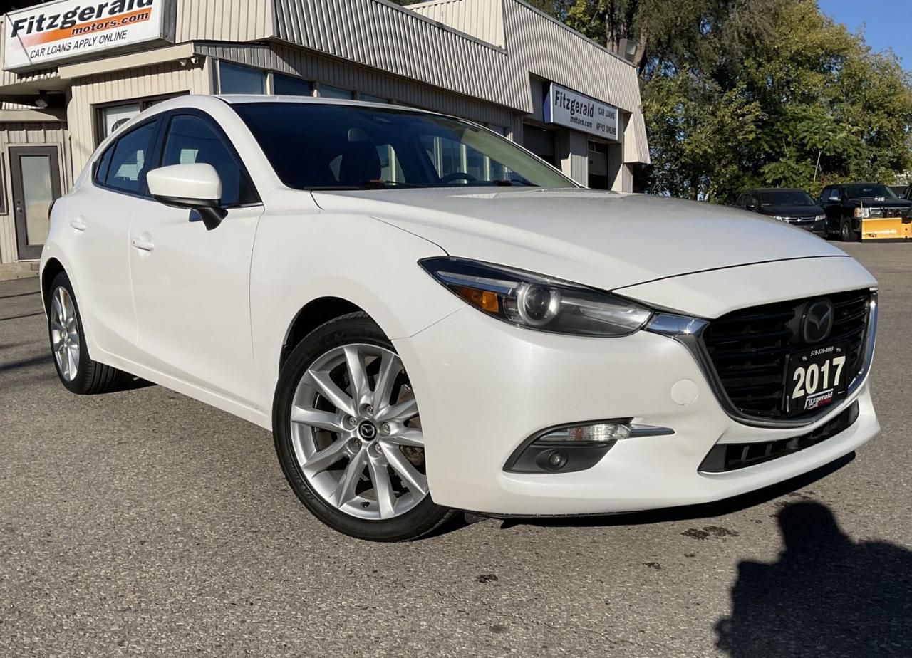 <div><span>Vehicle Highlights:</span><br><span>- Accident free<br></span><span>- New brakes all around</span><br><span>- Highly optioned tech pkg</span></div><br /><div><br><span>Here comes another beautiful Mazda 3 GT hatchback with all the goodies! This sporty hatch is in excellent condition in and out and drives very nice! Well cared for over the years, must be seen and driven to be appreciated!</span></div><br /><div><br><span>Loaded with the powerful 2.5L - 4 cylinder engine, automatic transmission, navigation system, back-up camera, blind-spot monitoring, rear cross traffic alert, lane departure warning, adaptive cruise control, fog lights, leather interior, heated seats, heated steering wheel, power locks, power mirrors, power windows, alloys, sunroof, digital climate control, A/C, BOSE audio, AM/FM/CD/AUX/USB, Bluetooth, smart key, push start, alarm, and much more!</span><br><br></div><br /><div><span>Certified!</span><br><span>Carfax available!</span><br><span>Extended warranty available!</span><br><span>Financing available for as low as 8.99% O.A.C</span><br><span>$17,499 PLUS HST & LIC. - Cash price<br></span><span>$17,898 PLUS HST & LIC. - Finance price</span></div><br /><div><br></div><br /><div><span>Please call us at 519-579-4995 for any questions you have or drop by FITZGERALD MOTORS located at 380 Courtland Ave East. Kitchener, ON for a test drive! Visit us online at </span><a href=http://www.fitzgeraldmotors.com/ target=_blank><span>www.fitzgeraldmotors.com</span></a></div><br /><div><a href=http://www.fitzgeraldmotors.com/ target=_blank><span><br></span></a><span>*Even though we take reasonable precautions to ensure that the information provided is accurate and up to date, we are not responsible for any errors or omissions. Please verify all information directly with Fitzgerald Motors to ensure its exactitude.</span></div>