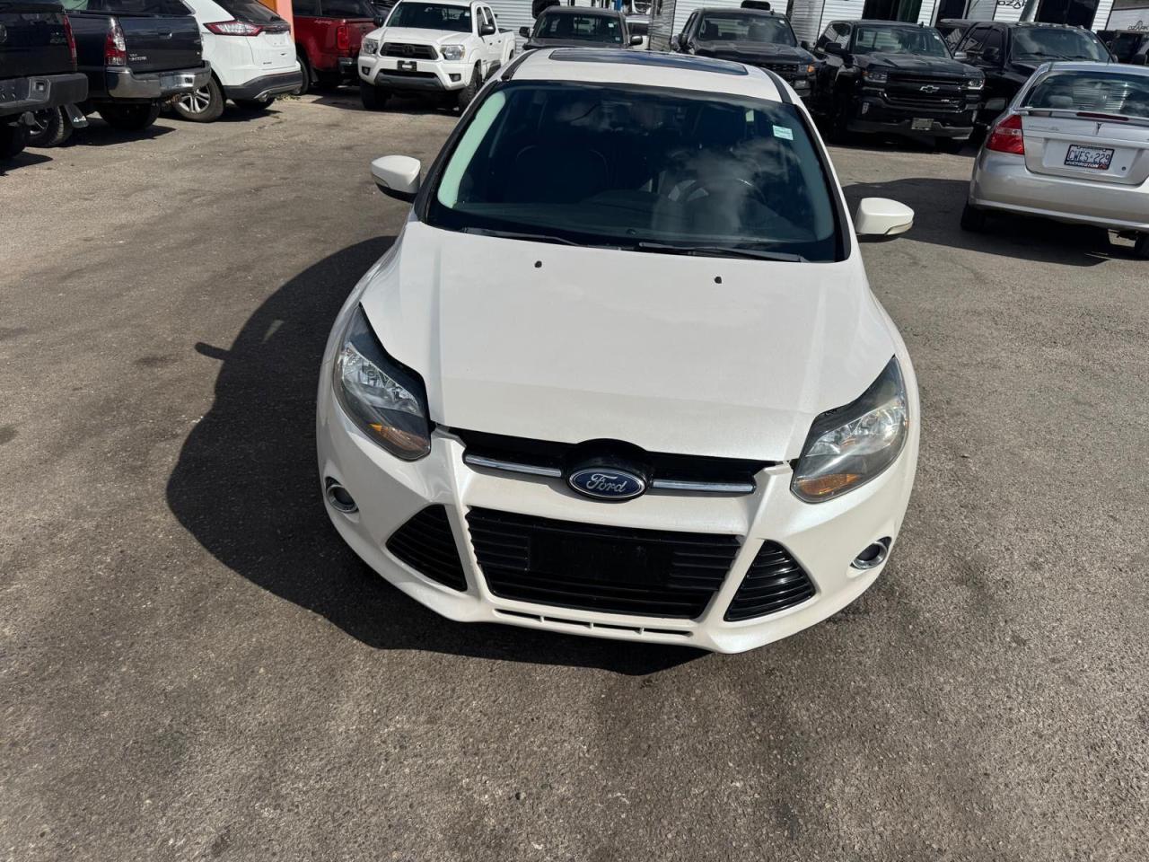 2012 Ford Focus Titanium, LEATHER, WINTER TIRES, CERTIFIED - Photo #7