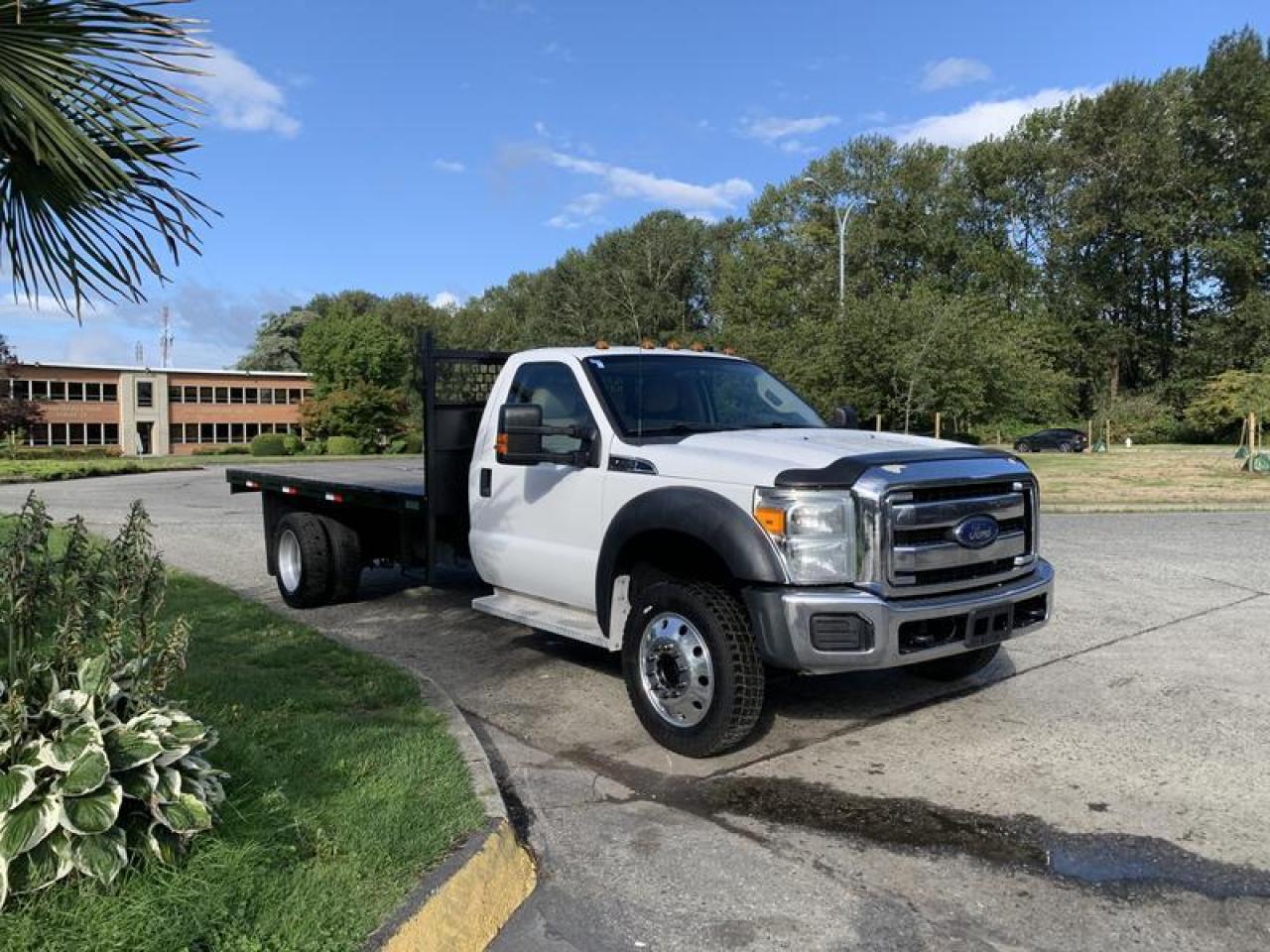 2013 Ford F-450 SD Regular Cab DRW Flatdeck 2WD  Dually, 6.8L, 6.8L V10 SOHC 30V engine, 10 cylinder, RWD, cruise control, air conditioning, AM/FM radio, power windows, power mirrors, white exterior, black interior, cloth. Deck Dimensions:  Length is 13 Feet 8 Inches Width is 8 Feet.  $14,550.00 plus $375 processing fee, $14,925.00 total payment obligation before taxes.  Listing report, warranty, contract commitment cancellation fee, financing available on approved credit (some limitations and exceptions may apply). All above specifications and information is considered to be accurate but is not guaranteed and no opinion or advice is given as to whether this item should be purchased. We do not allow test drives due to theft, fraud, acts of vandalism and undetectable impaired driving. Instead we provide the following benefits: Complimentary Warranty (with options to extend), Limited Money Back Satisfaction Guarantee on Fully Completed Contracts, Contract Commitment Cancellation, and an Open-Ended Sell-Back Option. Ask seller for details or call 604-522-REPO(7376) to confirm listing availability.