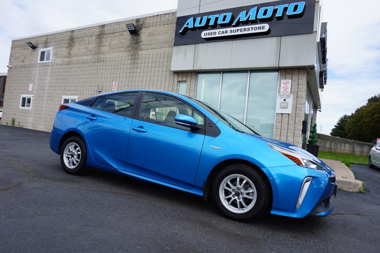 <div>*AWD HYBRID*ONE OWNER*FREE ACCIDENT*LOCAL ONTARIO CAR*SAFETY INCLUDED<span>*GREAT CONDITION*</span><span> Very Nice Clean Toyota Prius Hybrid Sedan 1.8L 4Cyl with Automatic Transmission has Cruise Control and Bluetooth and AUX. Blue on Black Leather Interior. Fully Loaded with: Power Locks, and Power Mirrors, and Power </span><span>Windows</span><span>, CD/AUX, AC, Curb Side </span><span>Mirrors</span><span>, Bluetooth, Back Up Camera, Navigation System, Blin Spot Monitor, Lane Departure Warning, Heated Seats, Fog Lights, Alloys, Cruise Control, AND ALL THE POWER OPTIONS!! </span></div><span>-------------------------------------------------</span><br /><span>Financing options are available start from 6.99% with $0 Down payment O.A.C.</span><br /><span>-------------------------------------------------</span><br /><span>SAFETY CERTIFICATION INCLUDED*** Vehicle comes with: Safety Certification, and Car Fax Report ALL INCLUDED!! At no extra cost to you!! Dont miss this opportunity to own a high-quality, pre-owned vehicle. </span><br /><span>-------------------------------------------------</span><br /><br /><span>Additionally, our vehicles qualify for up to 4 years of extended warranty. Please speak to your sales representative for more information.</span><br /><span>-------------------------------------------------</span><br /><span>We are open Monday to Saturday from 10am - 6pm, Sundays Closed.</span><br /><span>-------------------------------------------------</span><br /><br /><span>We also welcome trade-ins, with on-site buyers available to estimate your vehicle on the same day.</span><br /><span>-------------------------------------------------</span><br /><br /><span>Visit us at 3219 Harvester Road, Burlington, L7N 3N8 or call us at Nine O Five-281-2255 for more information.</span><br /><span>------------------------------------------------</span><br /><span>Check our inventory at www automotoinc ca</span><br />