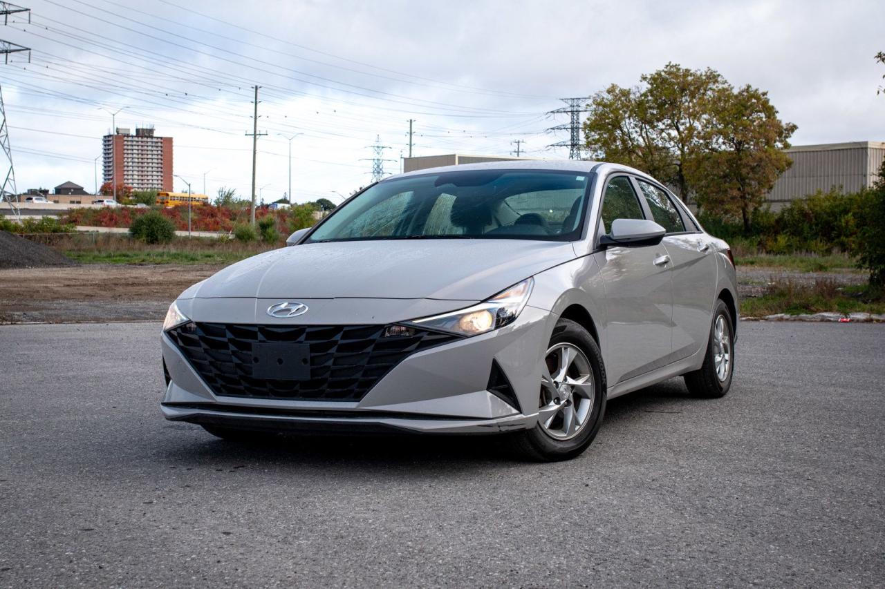 <div>Just in: a 2023 Hyundai Elantra Essential Sedan Automatic, showcasing a sleek Cyber Grey exterior on a luxurious black interior. This elegant sedan, with only 25,800 km on the odometer, is a one-owner vehicle and comes with a clean, accident-free history. Its in stock and ready for its new home.</div><br /><div>The Elantra Essential is known for its modern design, fuel efficiency, and comfortable driving experience. The automatic transmission ensures a smooth ride, while the Cyber Grey finish paired with the black interior exudes sophistication and style.</div><br /><div>Inside, youll find a spacious and well-appointed cabin equipped with the latest technology for both safety and entertainment. The Elantra is perfect for daily commutes, long-distance travel, or simply enjoying the pleasure of driving a nearly new vehicle.</div><br /><div>With its combination of style, efficiency, and Hyundais renowned reliability, this 2023 Elantra Essential is an excellent choice for anyone seeking a contemporary, economical, and stylish sedan.</div><br /><div>Offering home delivery and Canada-wide shipping. Financing options for all credit types. Trades welcome. Visit our website for more details and make this Hyundai Elantra yours today with AutoAgents.</div><br /><div>Due to limited stock, this price is for financing customers only. Cash buyers are welcome but an additional $1500 fee will be applicable. </div>