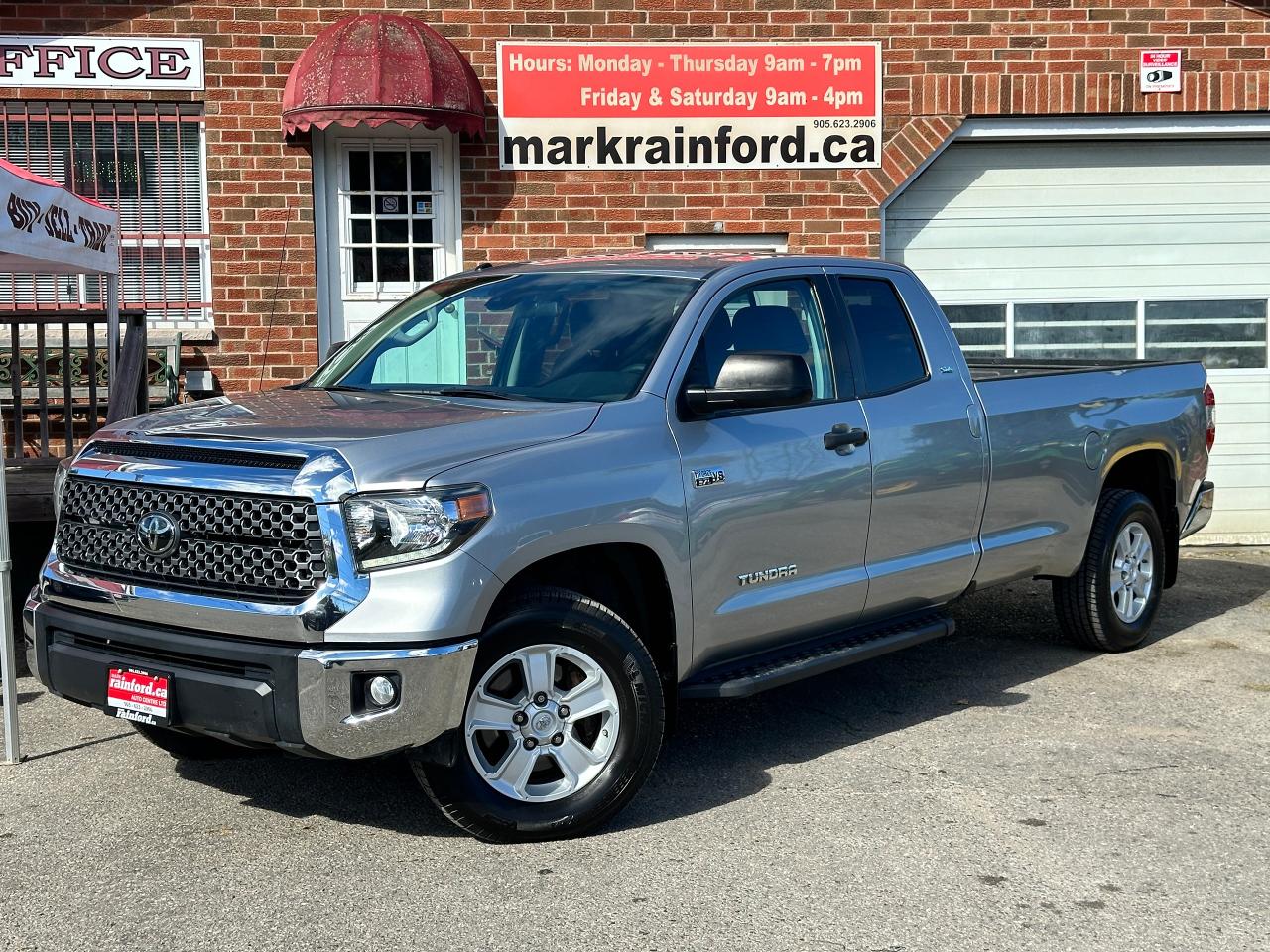 <p>ULTRA-Clean, LOW KM, Toyota Tundra Double Cab from Kingston, ON! This SR5 Plus Longbox 4x4 model is a truly stunning truck in fantastic condition, featuring great options inside and out! The exterior features keyless entry, automatic headlights, foglights, automatic high beams, black running boards, a trailer hitch, spray-in bed liner, tinted rear privacy glass, heated side mirrors, a trailer hitch, sliding rear glass, forward collision/lane departure assist, gorgeous factory alloy wheels, a spacious and rare long box, bedlights, a powerful 5.7L V8 engine and automatic transmission powering the 4x4 system! The interior is very clean and comfortable with heated cloth front seats with driver power adjustment and lumbar control, comfortable rear seating with a fold-up rear bench, power door locks, windows and mirrors, steering wheel audio and cruise controls, an easy-to-read and use gauge cluster, integrated electronic trailer brake controller with TOW/HAUL mode, electronic 4x4 selection, a large central touch screen AM/FM/XM Satellite HD Radio with Bluetooth, Backup Camera, MP3, ECOVIEW, and CD Player, A/C Climate control with defrost setting, USB/AUX/12V accessory ports, and more!</p><p> </p><p>Carfax Claims Free, this Truck is a SHOW STOPPER!</p><p> </p><p>Call (905) 623-2906</p><p> </p><p>Text Ryan: (905) 429-9680 or email: ryan@markrainford.ca</p><p> </p><p>Text Mark: (905) 431-0966 or email: mark@markrainford.ca</p>