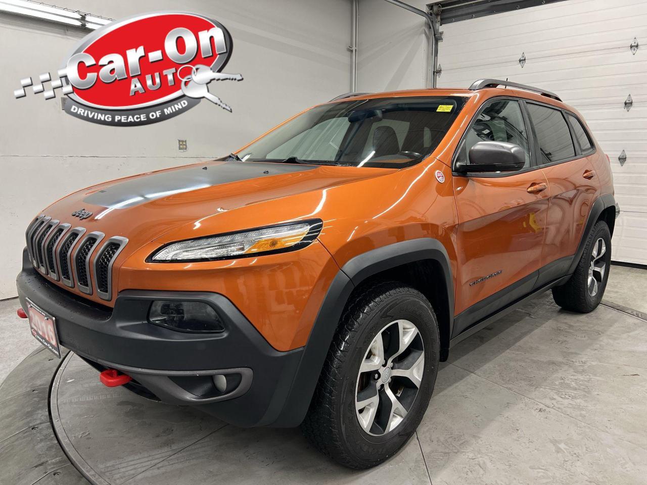 STUNNING MANGO TANGO 4x4 TRAILHAWK LOADED W/ PREMIUM 3.2L V6, COLD WEATHER GROUP, COMFORT/CONVENIENCE GROUP AND PREMIUM HEATED/COOLED NAPPA LEATHER SEATS!! Remote start, backup camera, 17-inch alloys, 8.4 inch touchscreen, dual zone climate control, keyless entry w/ push start, full power group incl. power seat w/ memory, premium tow package (4,500lb capacity), leather-wrapped steering wheel, auto-dimming rearview mirror, Bluetooth and Sirius XM!