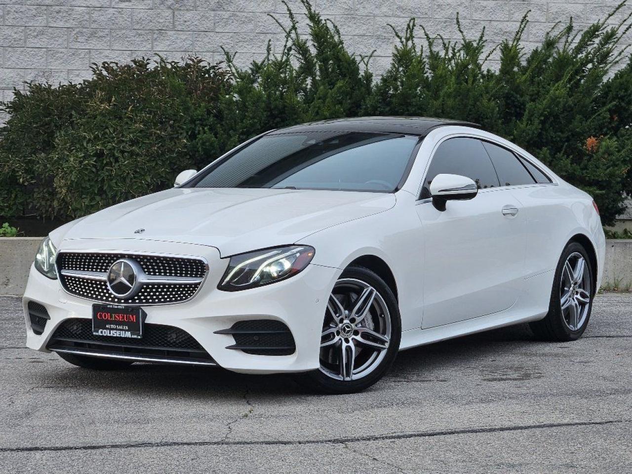 <p>Experience the Pinnacle of Elegance: The 2018 Mercedes-Benz E400 Coupe with 4MATIC</p><p>Step into a world where performance meets luxury. This stunning 2018 Mercedes-Benz E400 Coupe, featuring the coveted AMG Sport Package, is more than just a vehicleits an expression of refined taste and sophistication.</p><p>Draped in a pristine white finish, the sleek curves and bold lines of this coupe command attention, while the black interior, illuminated by customizable ambient lighting, envelops you in pure opulence. Whether day or night, the interior lighting sets the perfect mood for any journey.</p><p>Equipped with 4MATIC all-wheel drive, this coupe isnt just about looksits designed to conquer the road with confidence. The advanced system ensures impeccable handling and traction, no matter the conditions, making every drive as smooth as it is thrilling.</p><p>Powered by a 3.0L bi-turbo V6, the E400 delivers 329 horsepower with effortless grace. The AMG Sport Package enhances both the look and the drive, while cutting-edge technology and premium materials ensure that your comfort and convenience are always paramount.</p><p>For those who demand the best in performance, style, and all-weather capabilitythe 2018 Mercedes-Benz E400 Coupe 4MATIC awaits.</p><p>Indulge in excellence. Drive the extraordinary.</p><p>NO ACCIDENTS, CLEAN CARFAX! FULL SERVICE HISTORY!</p><p>{ CERTIFIED PRE-OWNED }</p><p>**THIS VEHICLE COMES FULLY CERTIFIED WITH A SAFETY CERTIFICATE & SERVICED AT NO EXTRA COST**</p><p>**$0 DOWN...PRIME RATE FINANCING APPROVALS**o.a.c.</p><p>WE CAN FINANCE INTERNATIONAL STUDENTS, NEW IMMIGRANTS, WORK PERMITS, #9 SIN, AND PR RESIDENTS!</p><p>#BEST DEAL IN TOWN! WHY PAY MORE ANYWHERE ELSE?</p><p>TAKE ADVANTAGE OF OUR VOLUME BASED PRICING TO ENSURE YOU ARE GETTING **THE BEST DEAL IN TOWN**!!! THIS VEHICLE COMES FULLY CERTIFIED WITH A SAFETY CERTIFICATE AT NO EXTRA COST! FINANCING AVAILABLE & EXTENDED WARRANTIES AVAILABLE ON ALL VEHICLES!</p><p>COLISEUM AUTO SALES PROUDLY SERVING THE CUSTOMERS FOR OVER 25 YEARS! NOW WITH 2 LOCATIONS TO SERVE YOU BETTER. COME IN FOR A TEST DRIVE TODAY!<br>FOR ALL FAMILY LUXURY VEHICLES..SUVS..AND SEDANS PLEASE VISIT....</p><p>COLISEUM AUTO SALES ON WESTON<br>301 WESTON ROAD<br>TORONTO, ON M6N 3P1<br>4 1 6 - 7 6 6 - 2 2 7 7</p>