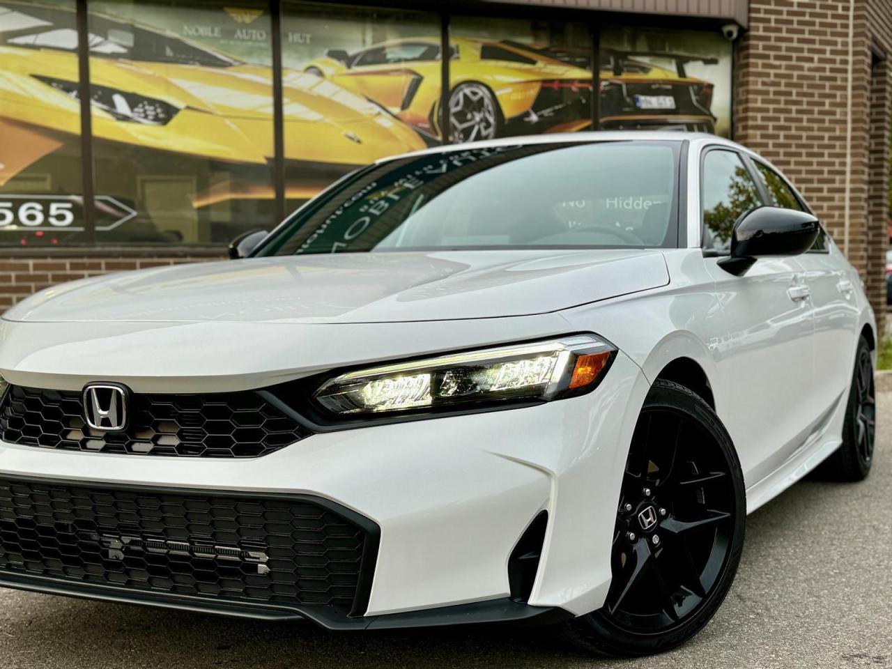 2025 Honda Civic Sport Photo2