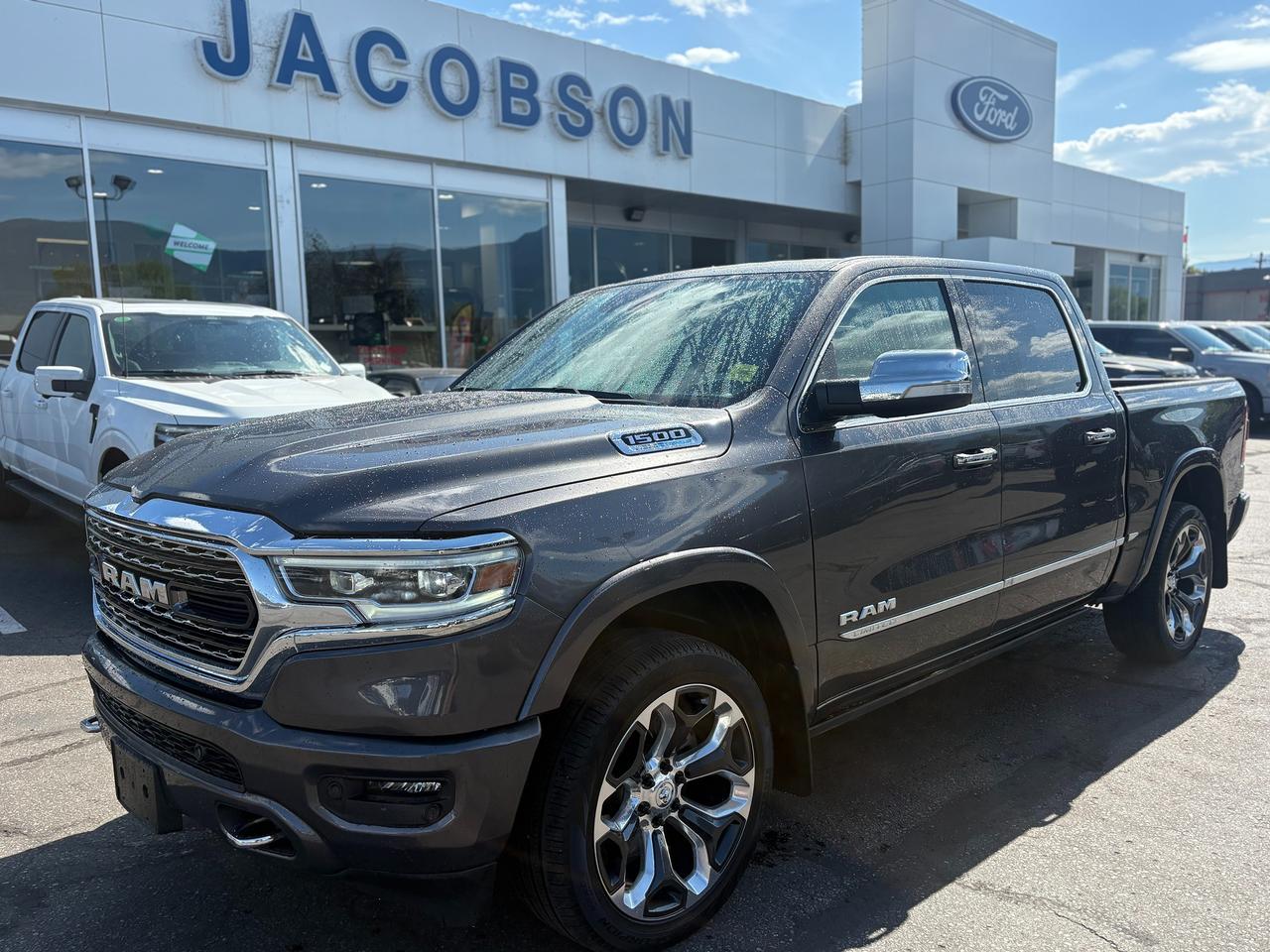 <p>Turn heads and tow with confidence in this 2022 RAM 1500 Limited. Finished in a sleek Gray exterior, this top-of-the-line Limited trim pairs upscale styling with serious capability. With just 61,545 km, its in excellent shape and ready for years of reliable driving. Highlights include the powerful 5.7L HEMI V8 with eTorque, an 8-speed automatic, four-wheel drive, plus a 12-inch touchscreen, auto-leveling air suspension, and power running boards for easy entry. Come test drive this loaded Limited at Jacobson Ford today!</p>