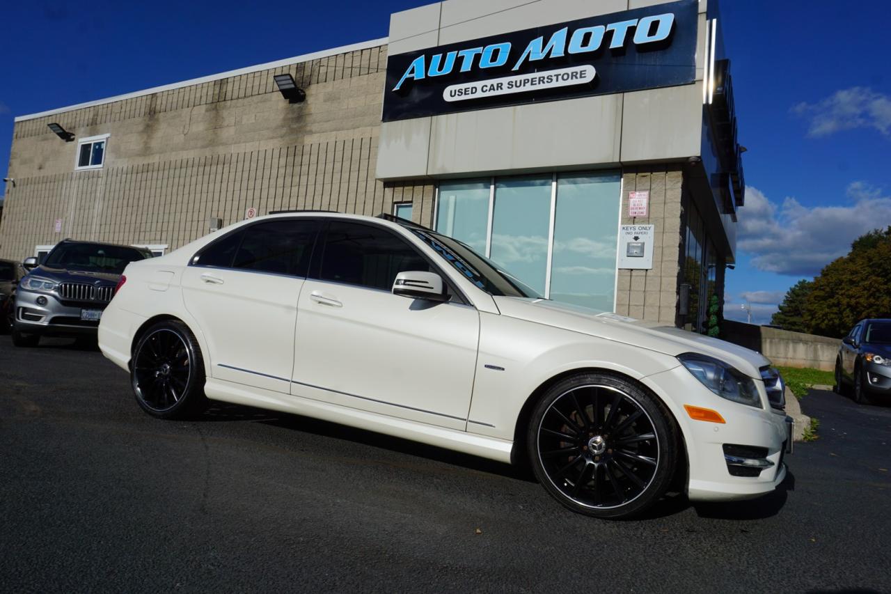 <div>*LOCAL ONTARIO CAR*SAFETY INCLUDED* <span>Come check out this Beautiful V6 AWD Mercedes Benz C350 4MATIC. Pearl White on Black Leather Interior. Fully Equipped with all options: Bluetooth, Power Windows, Power Locks, Power Heated Mirrors, Auto Dimming Mirrors, CD, AC/ Dual Climate Control, Heated Seats, AC / Heat, Power Folding Mirrors, Keyless Entry, Alloys, Back Up Camera, Duel Roof, Steering Mounted Controls, Dual Climate Controls, Side Turning Signals, Fog Lights, Dual Power Front Seats, Navigation System, Front and Reverse Parking Sensors, Push to Start, AMG OEM Rims, Blind Spot Indicators, Premium Harman/Kardon audio system, Memory Driver Seat, ALL THE POWER OPTIONS!!!</span></div><pre><p><span>-------------------------------------------------</span><br /><span>Financing options are available start from 6.99% with $0 Down payment O.A.C.</span><br /><span>-------------------------------------------------</span><br /><span>SAFETY CERTIFICATION INCLUDED*** Vehicle comes with: Safety Certification, and Car Fax Report ALL INCLUDED!! At no extra cost to you!! Dont miss this opportunity to own a high-quality, pre-owned vehicle. </span><br /><span>-------------------------------------------------</span><br /><br /><span>Additionally, our vehicles qualify for up to 4 years of extended warranty. Please speak to your sales representative for more information.</span><br /><span>-------------------------------------------------</span><br /><span>We are open Monday to Saturday from 10am - 6pm, Sundays Closed.</span><br /><span>-------------------------------------------------</span><br /><br /><span>We also welcome trade-ins, with on-site buyers available to estimate your vehicle on the same day.</span><br /><span>-------------------------------------------------</span><br /><br /><span>Visit us at 3219 Harvester Road, Burlington, L7N 3N8 or call us at Nine O Five-281-2255 for more information.</span><br /><span>------------------------------------------------</span><br /><span>Check our inventory at www automotoinc ca</span></p></pre>