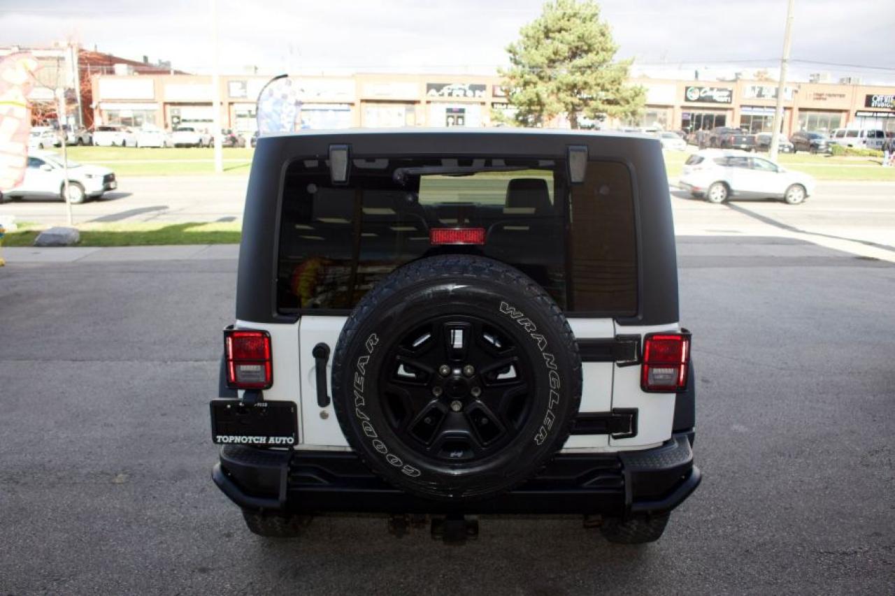 2013 Jeep Wrangler Unlimited Sahara Wrangler Unlimited Sahara - Photo #3
