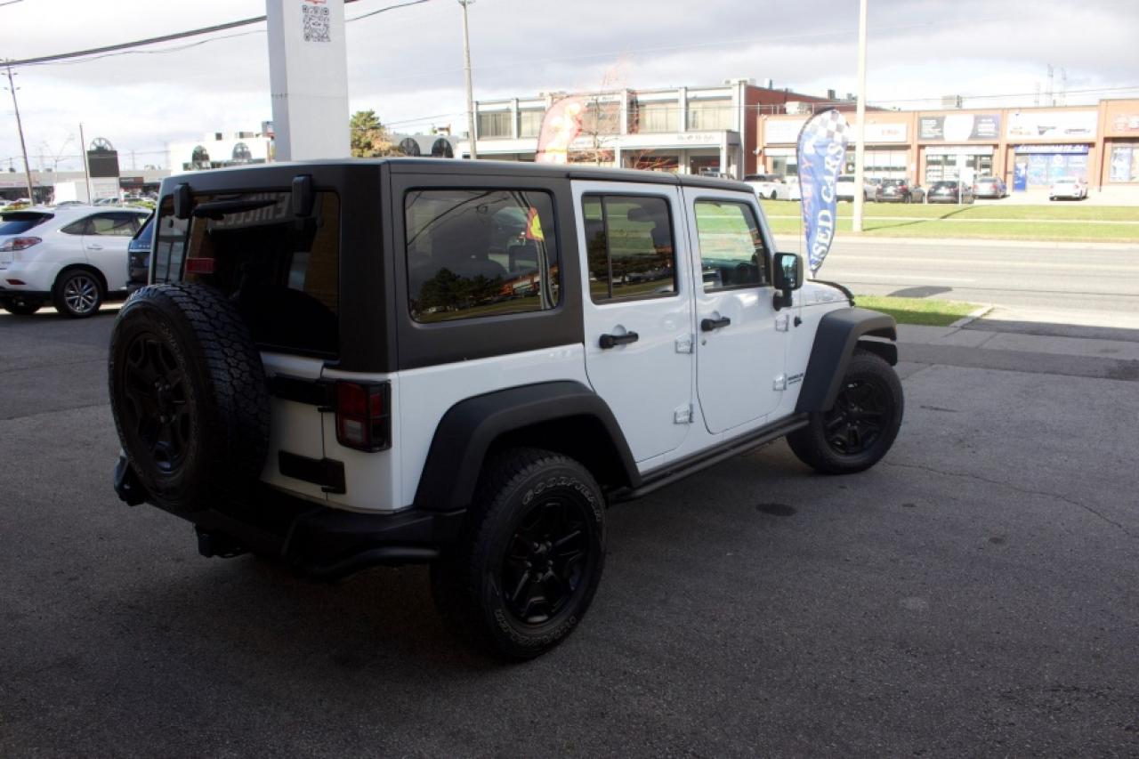 2013 Jeep Wrangler Unlimited Sahara Wrangler Unlimited Sahara - Photo #4