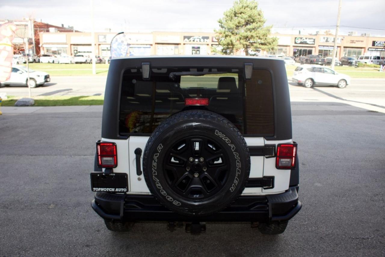 2013 Jeep Wrangler Unlimited Sahara Wrangler Unlimited Sahara - Photo #3