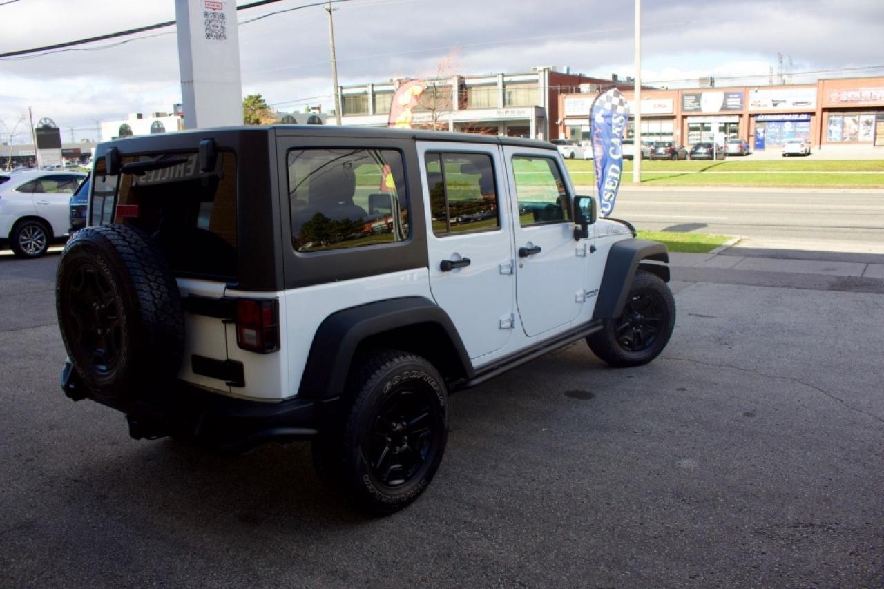 2013 Jeep Wrangler Unlimited Sahara Wrangler Unlimited Sahara - Photo #6